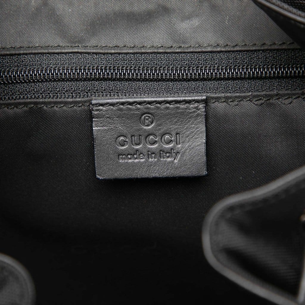 Gucci Canvas and Calfskin Jackie Drawstring Backpack