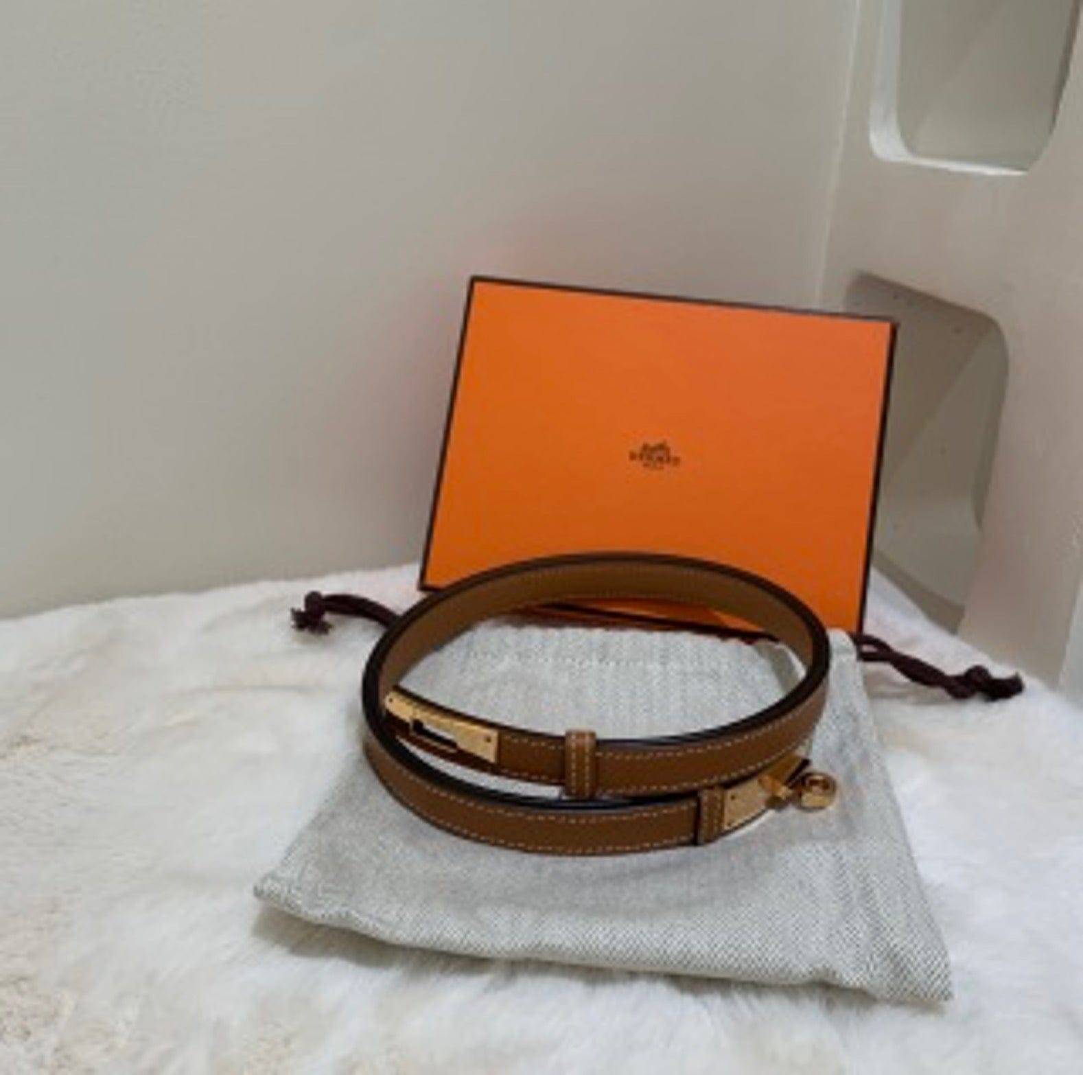 Hermes brown Kelly belt with Z - shaped engraving. US22112107