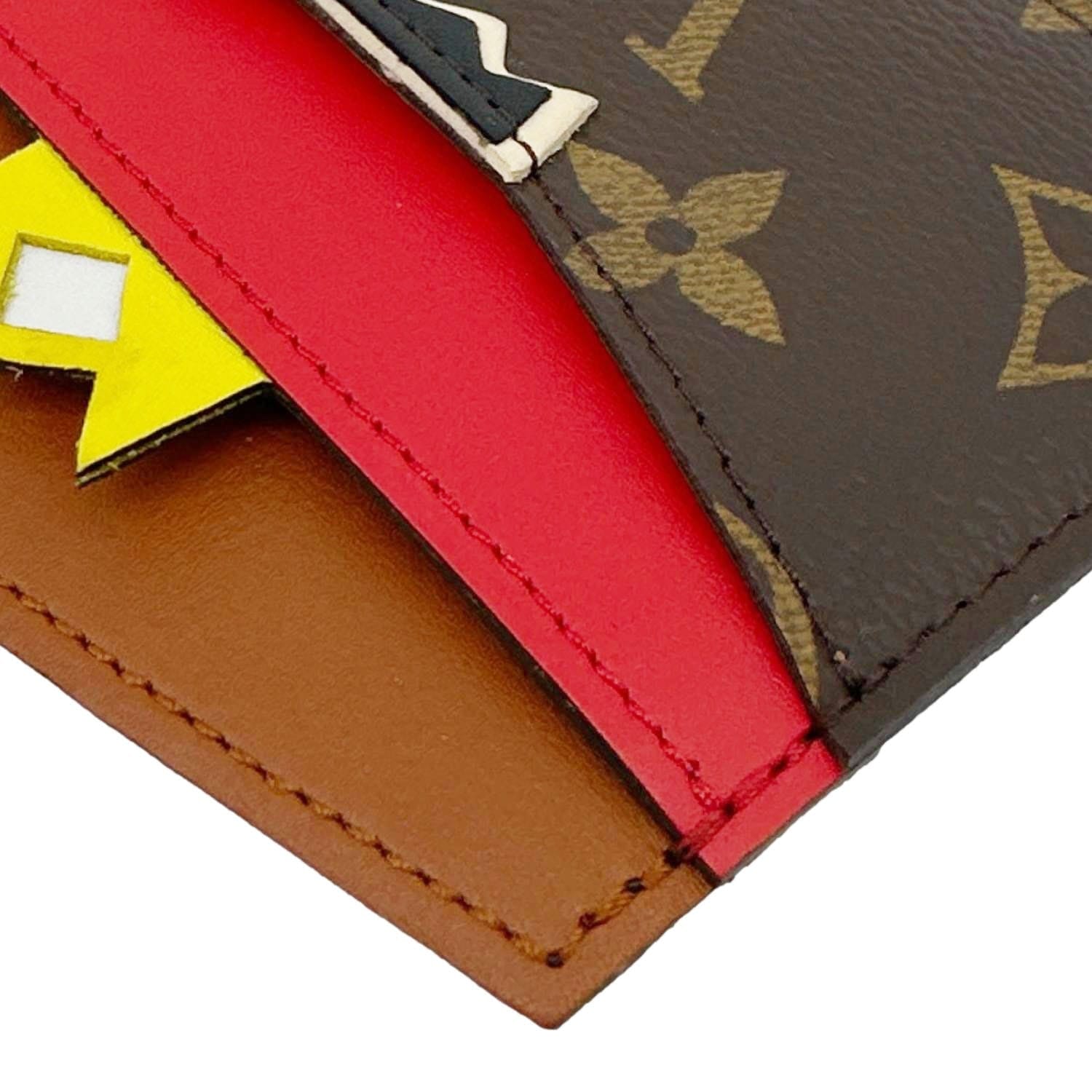 LOUIS VUITTON Tribal Mask Monogram Canvas Card Holder Brown