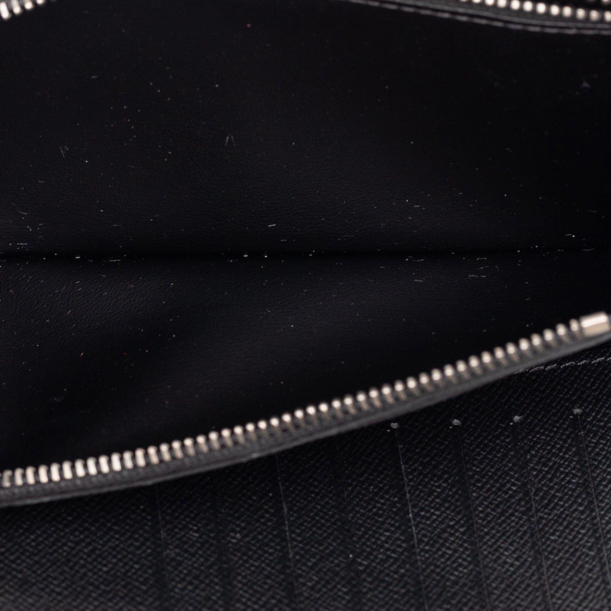 Louis Vuitton Monogram Eclipse Vertical Zippy Wallet