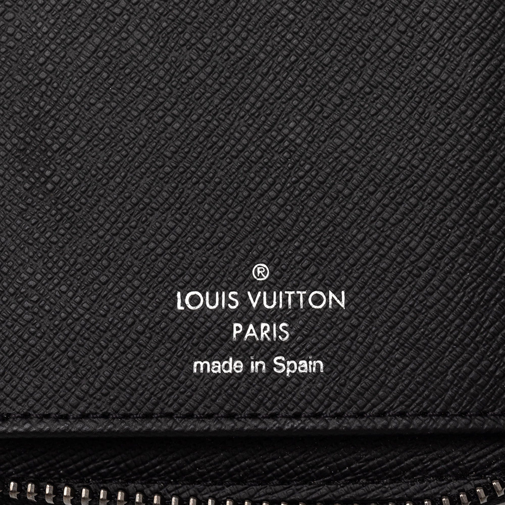 Louis Vuitton Monogram Eclipse Vertical Zippy Wallet
