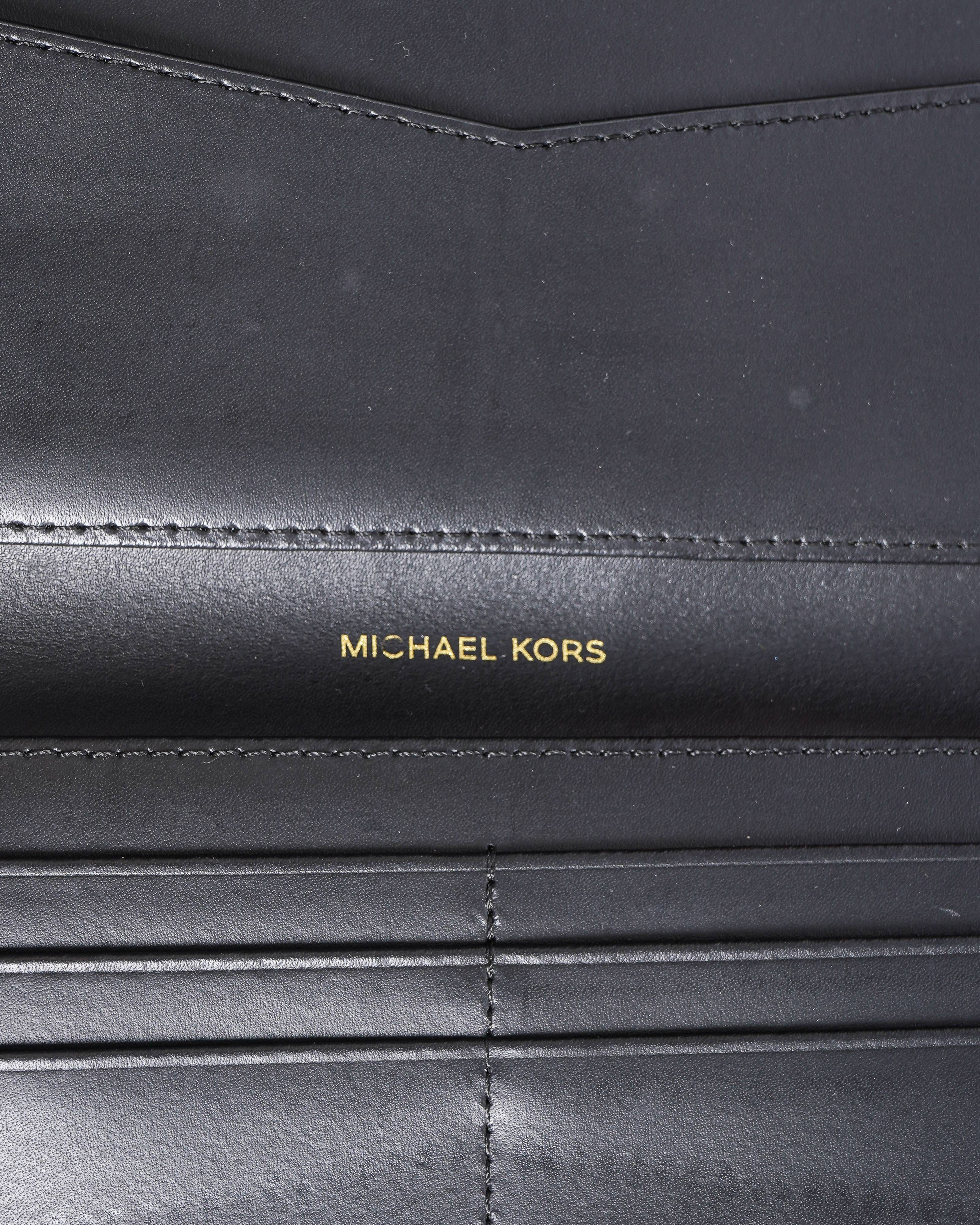 Michael Kors Embossed Monogram Zip Around Wallet In Black