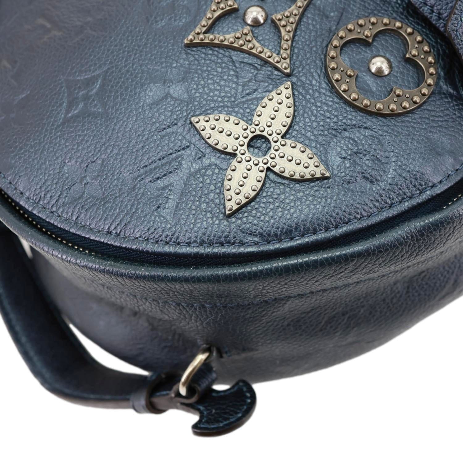 LOUIS VUITTON Flower Pins Monogram Empreinte Leather Backpack Blue