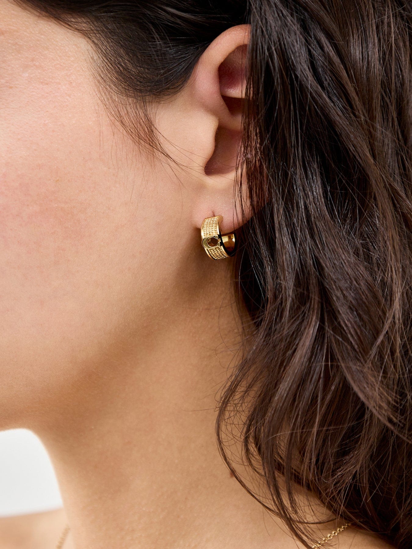 Coach Textured C Huggie Earrings Gold