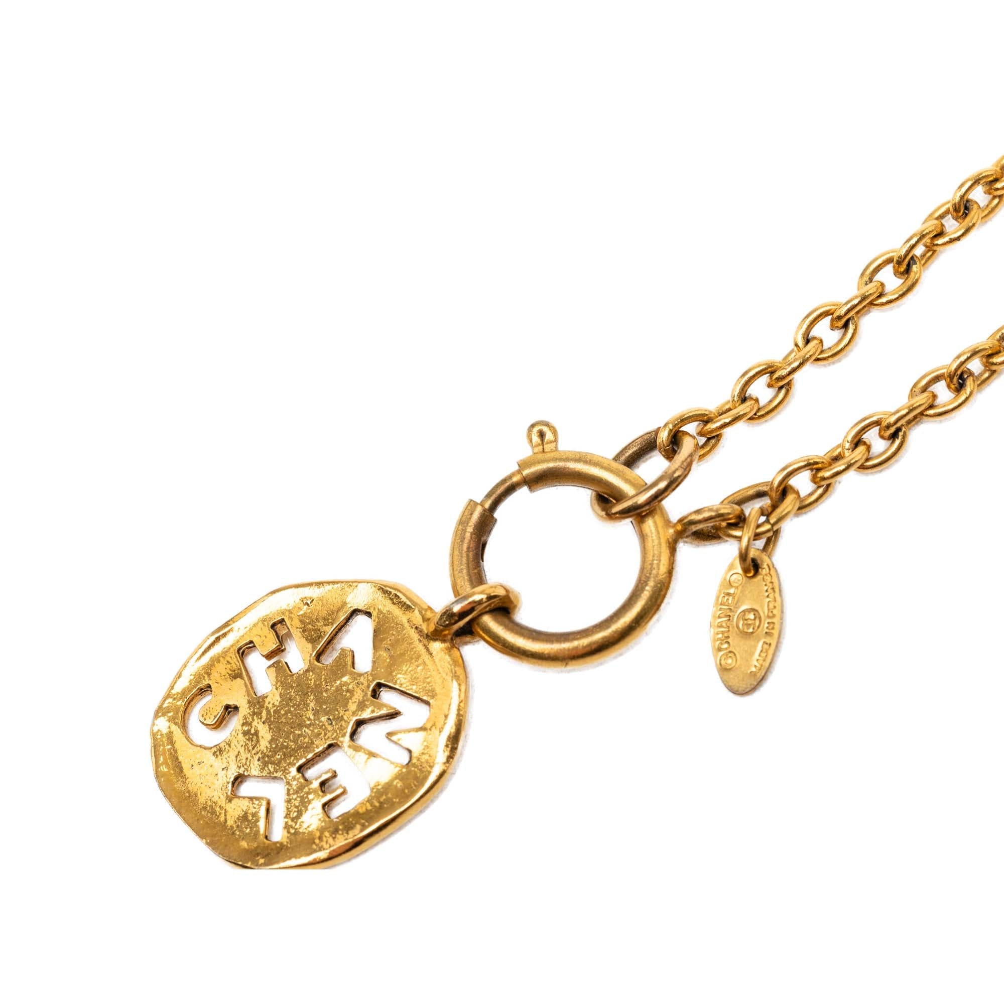 Chanel Gold Plated Cut Out Logo Pendant Necklace