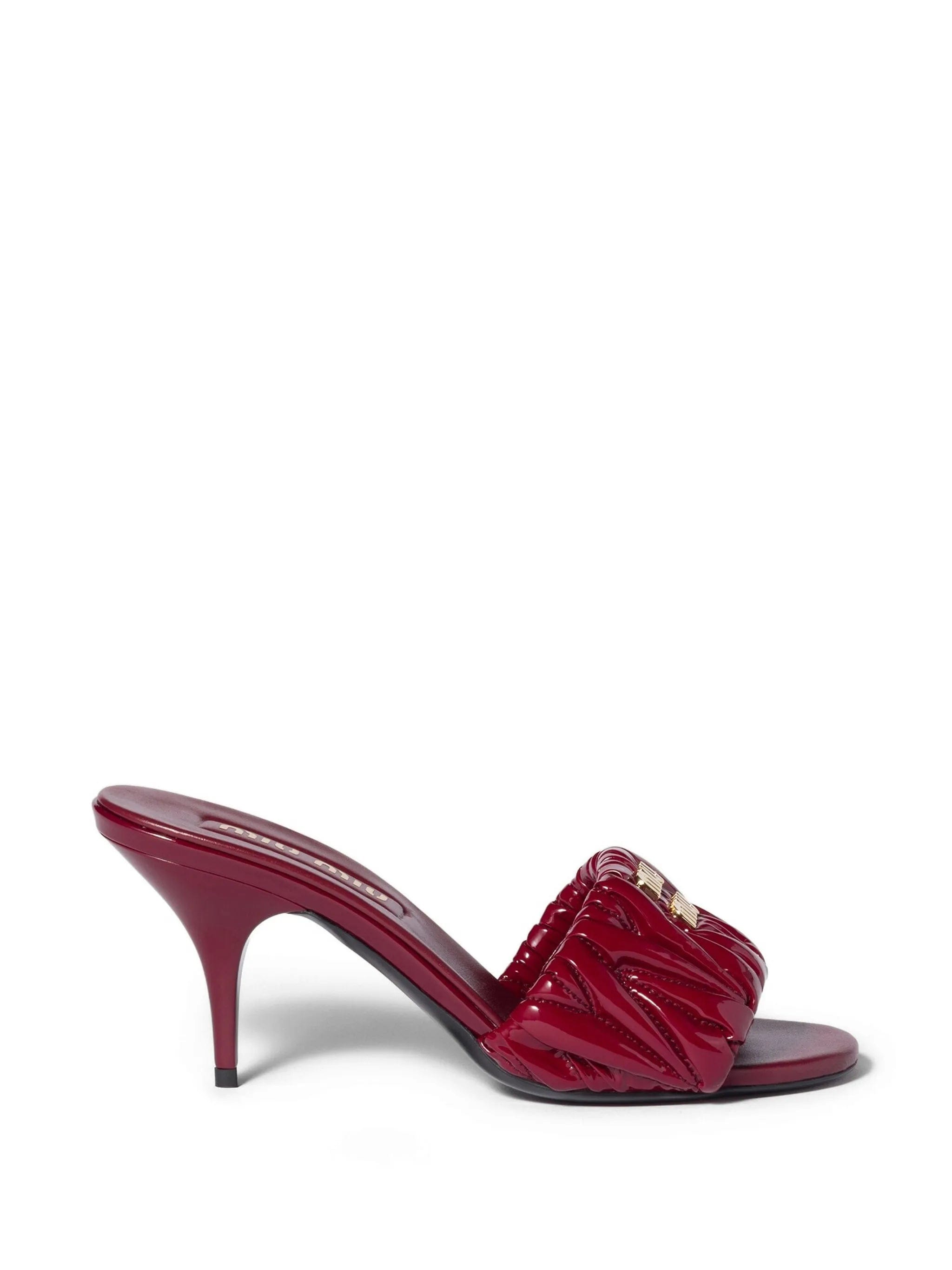 Miu Miu matelassé patent nappa leather mules