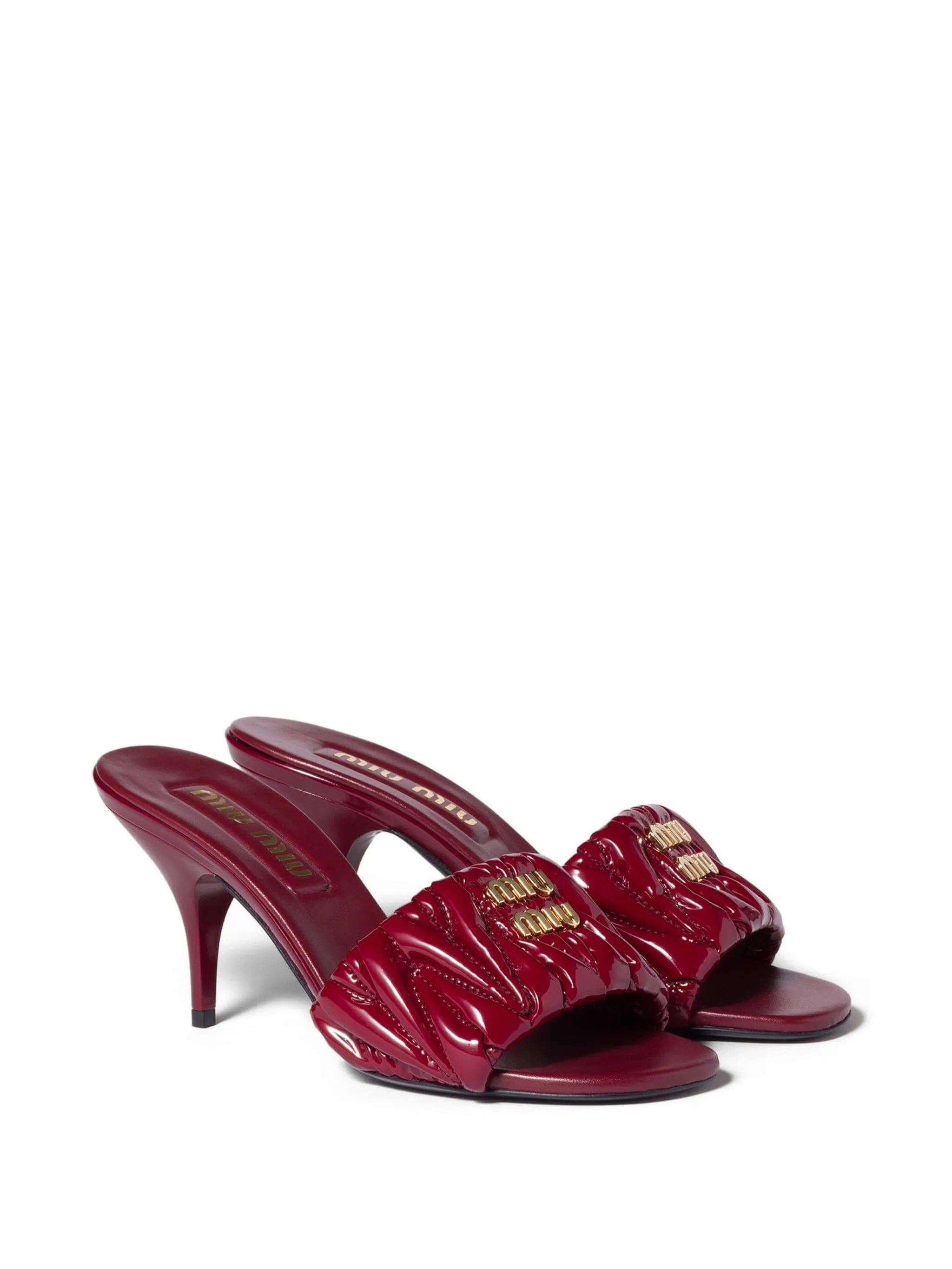 Miu Miu matelassé patent nappa leather mules