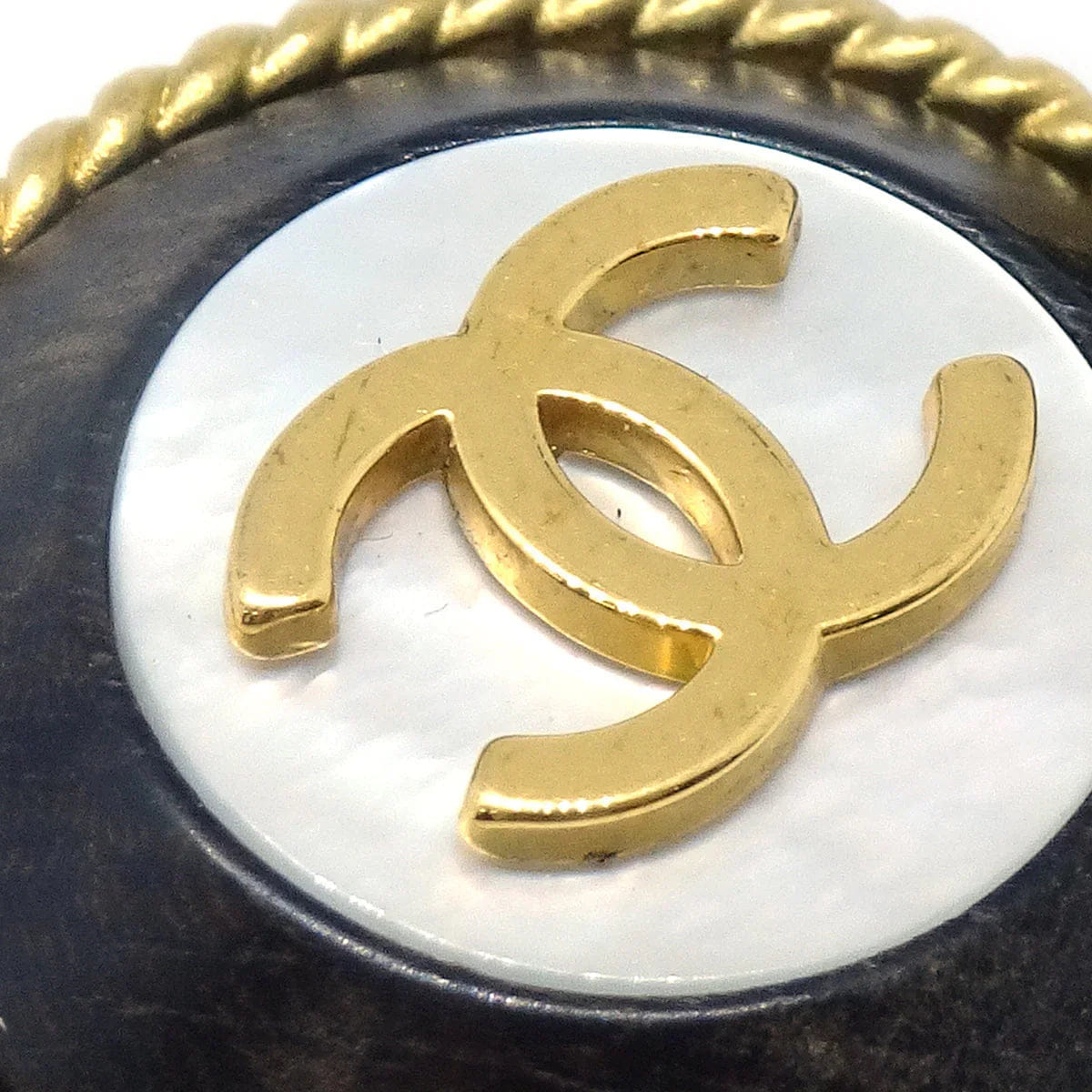 Chanel 1994 Mother of Pearl CC Rope Edge Button Earrings
