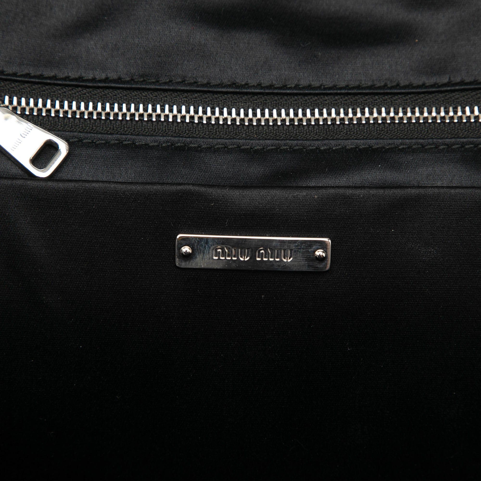 Miu Miu Leather Trimmed Matelasse Crystal Embellished Nylon Backpack