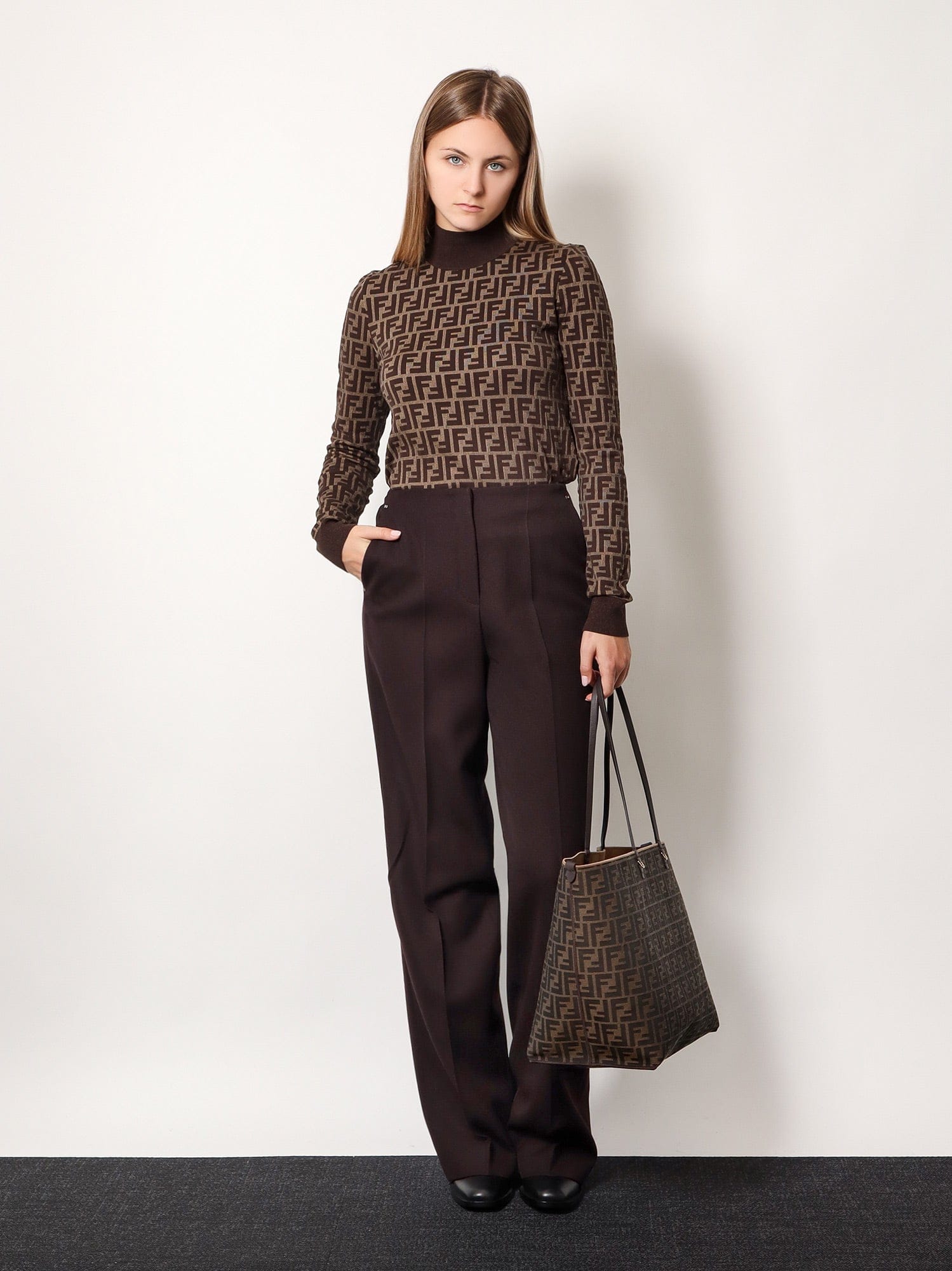 Fendi Virgin wool trousers with metal ff details
