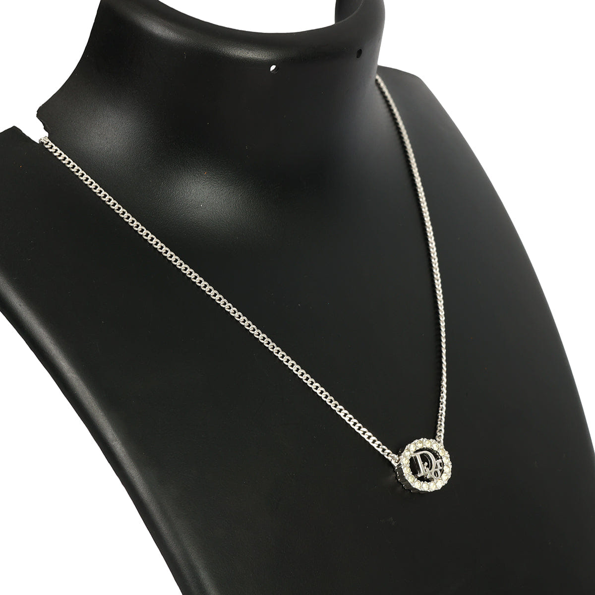 CHRISTIAN DIOR SILVER - TONE OVAL PENDANT WITH CRYSTAL DIOR LOGO