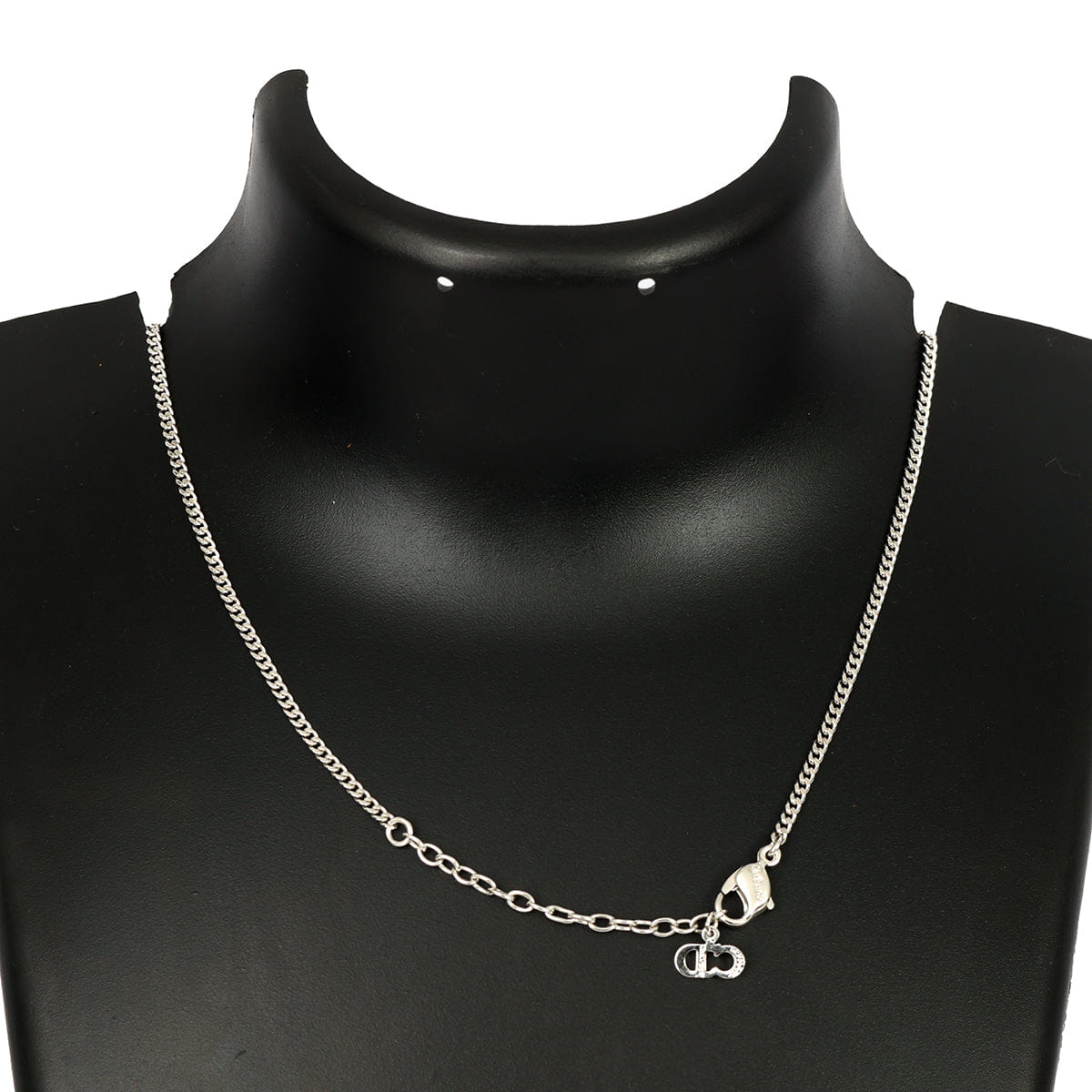 CHRISTIAN DIOR SILVER - TONE OVAL PENDANT WITH CRYSTAL DIOR LOGO
