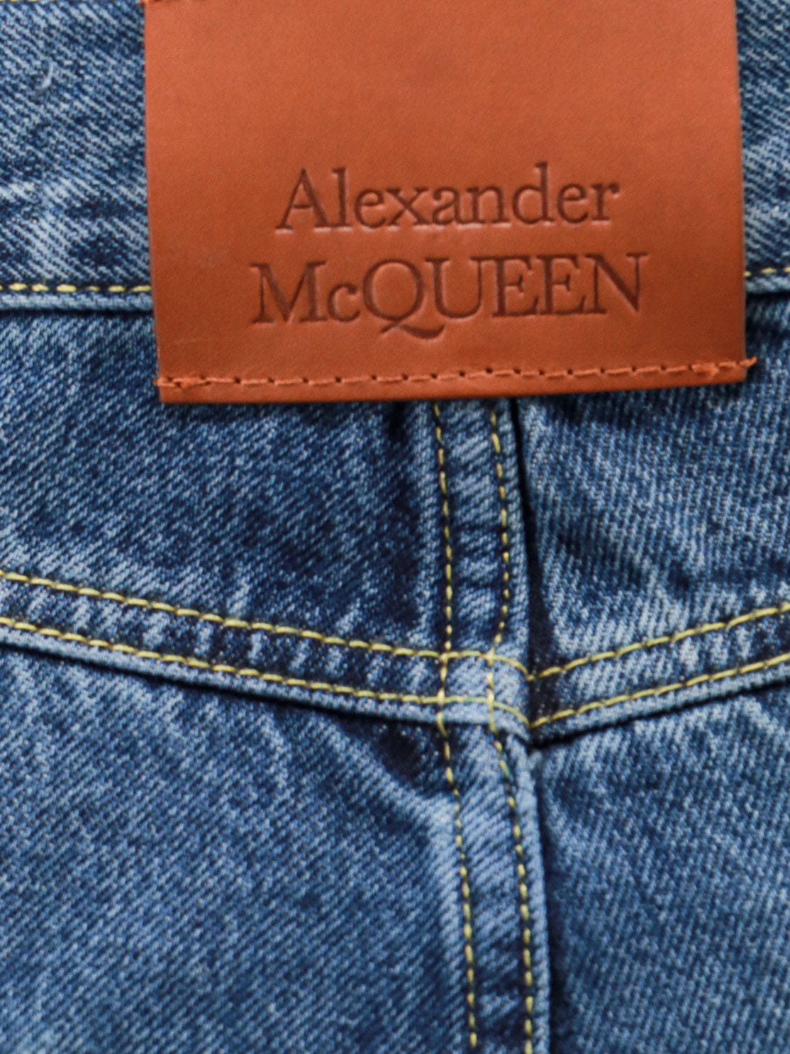 Alexander McQueen Cotton jeans with leather logo patch