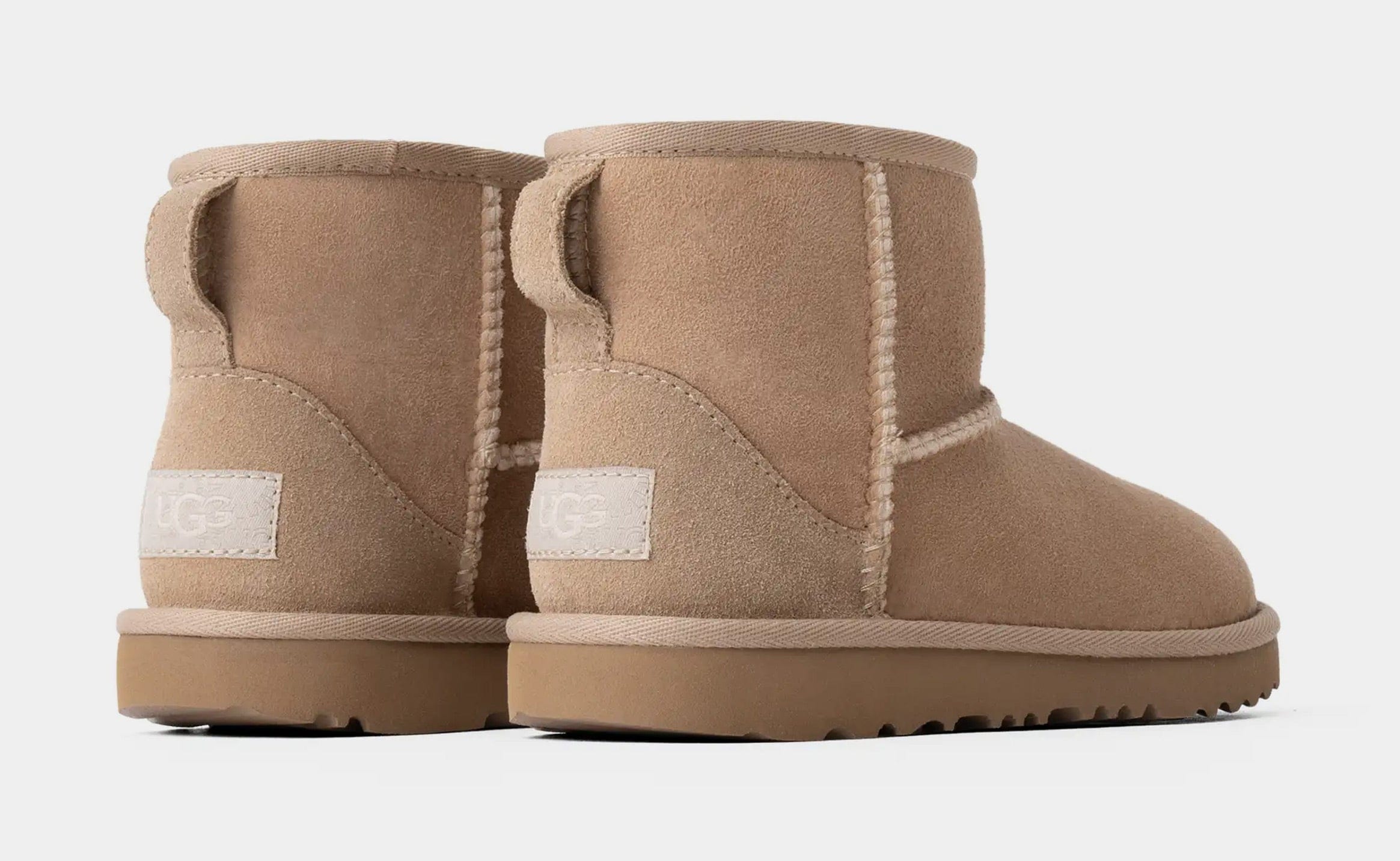 UGG Classic Mini II Grade School Boots (Sand/Beige)