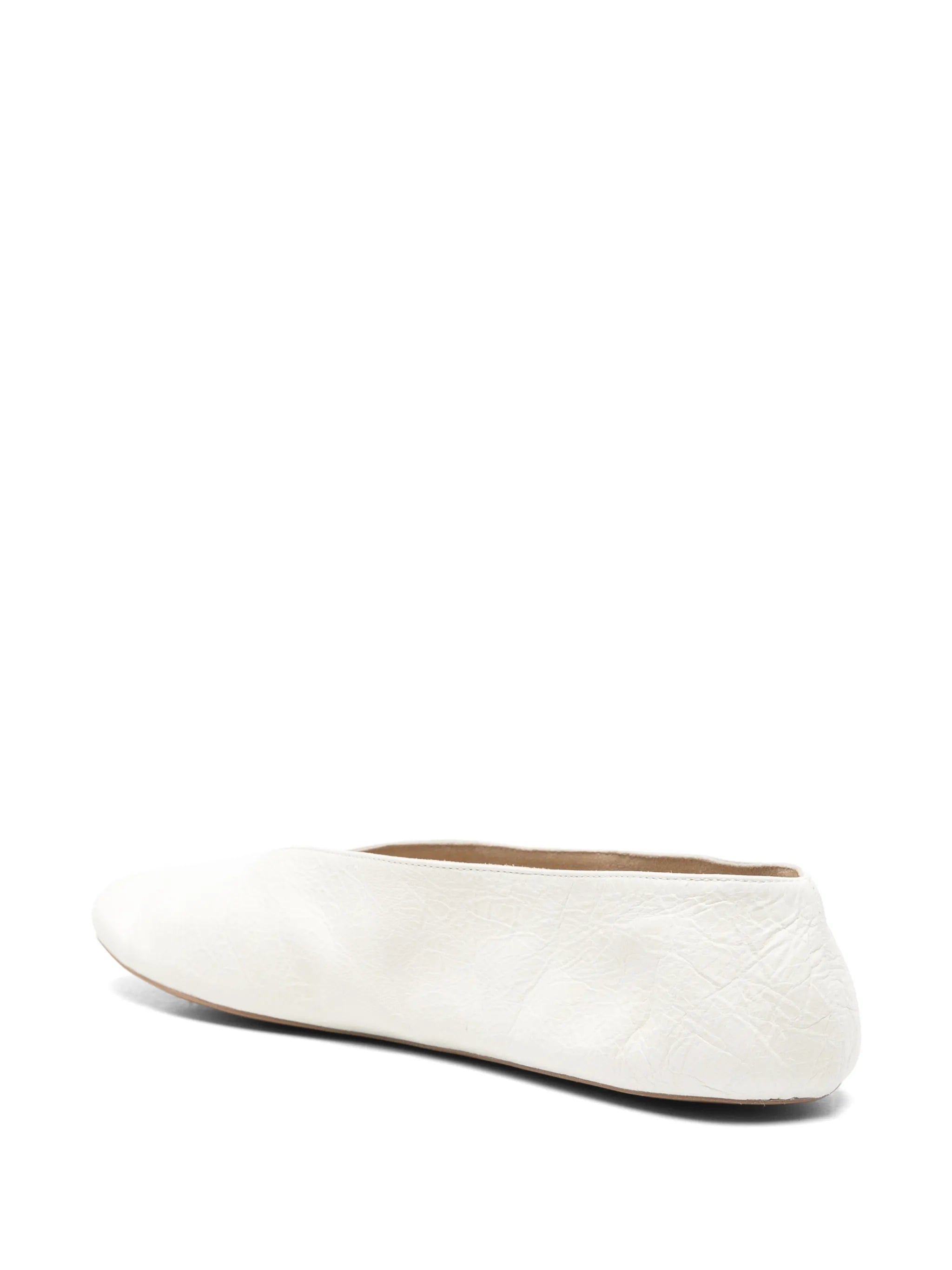 The Row V - neck textured leather loafers