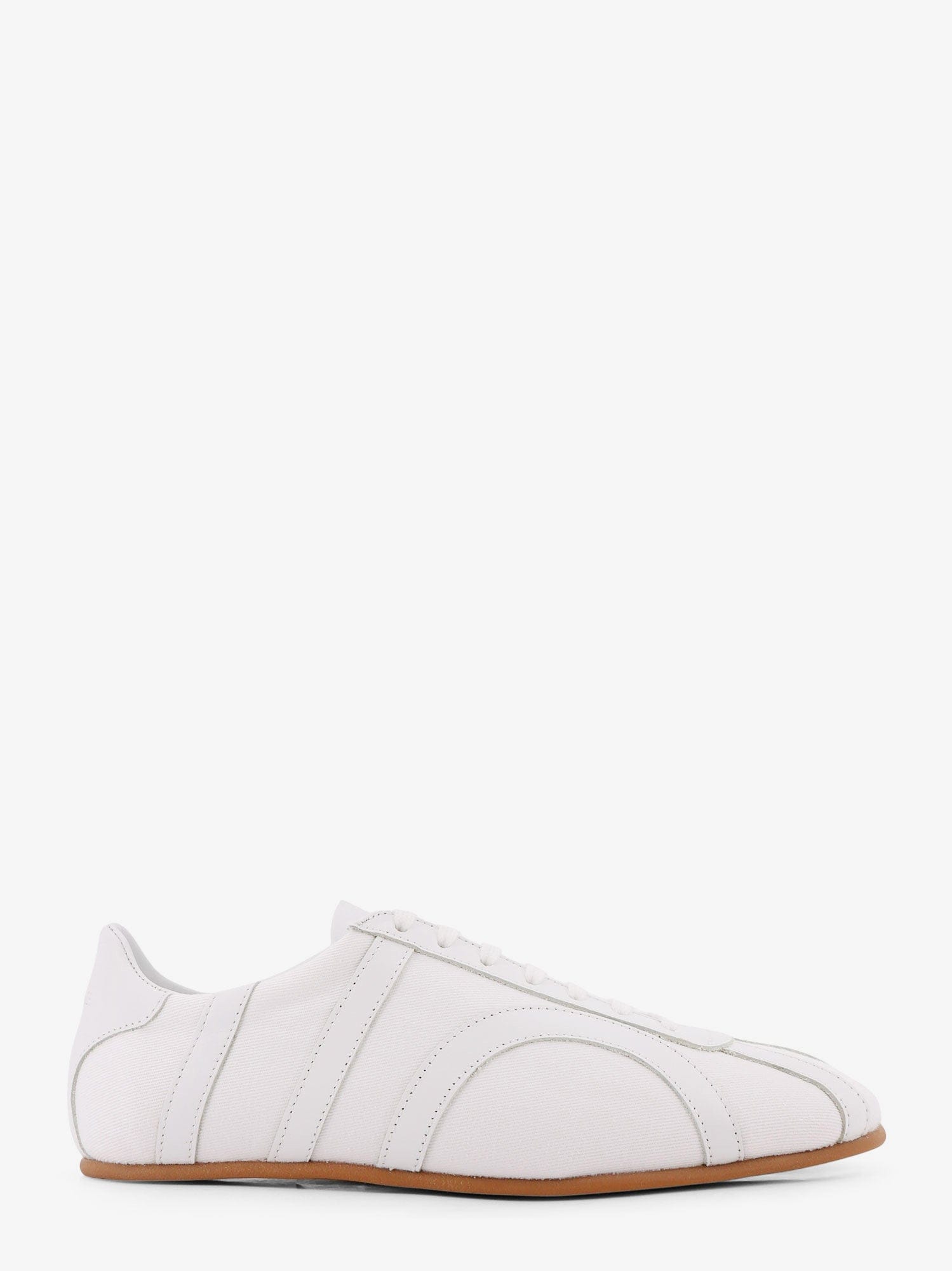 Toteme Canvas low - top sneakers with leather profiles