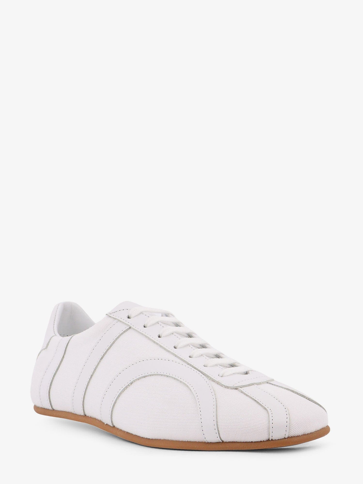 Toteme Canvas low - top sneakers with leather profiles