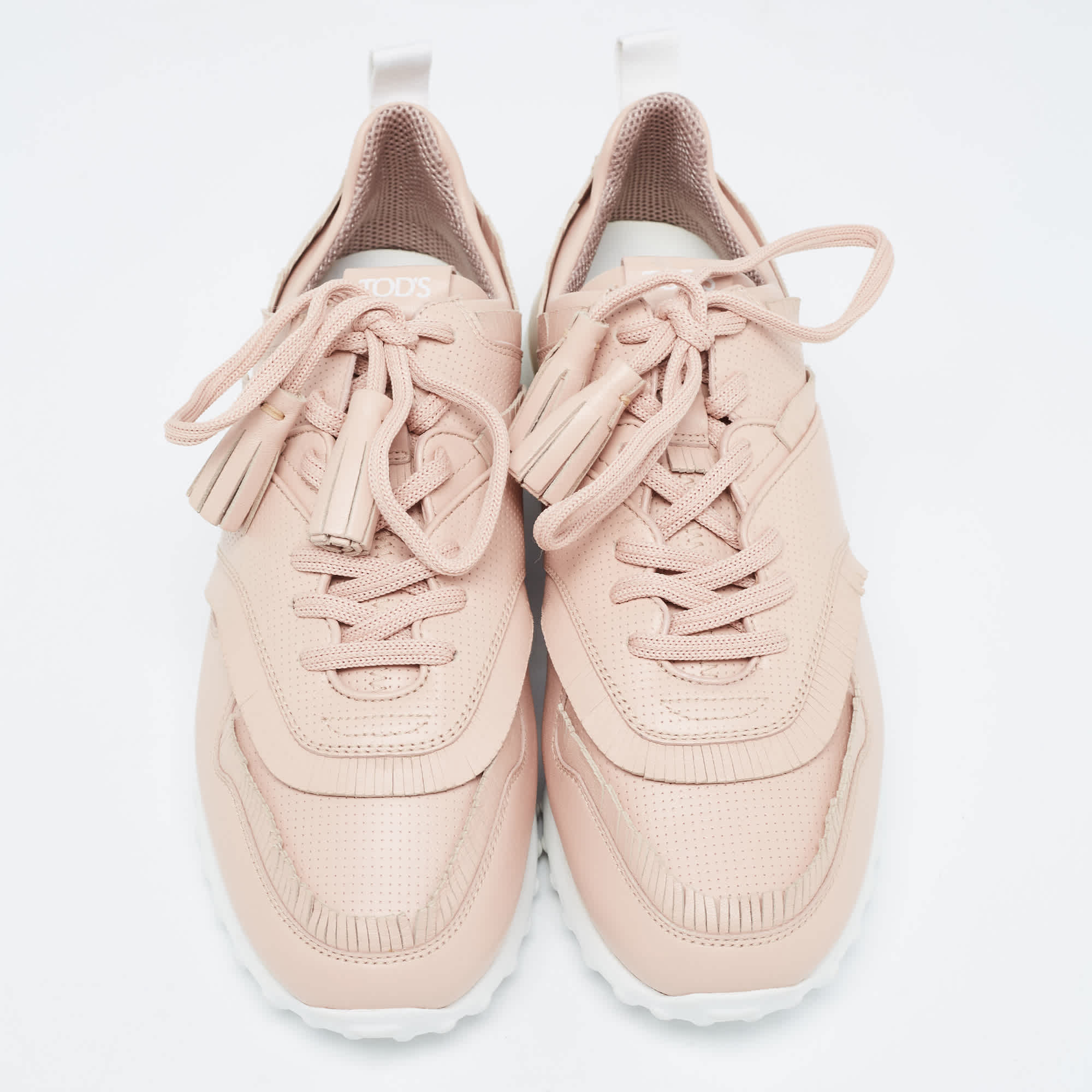 Tod's Pink Perforated Leather Fringed Low Top Sneakers