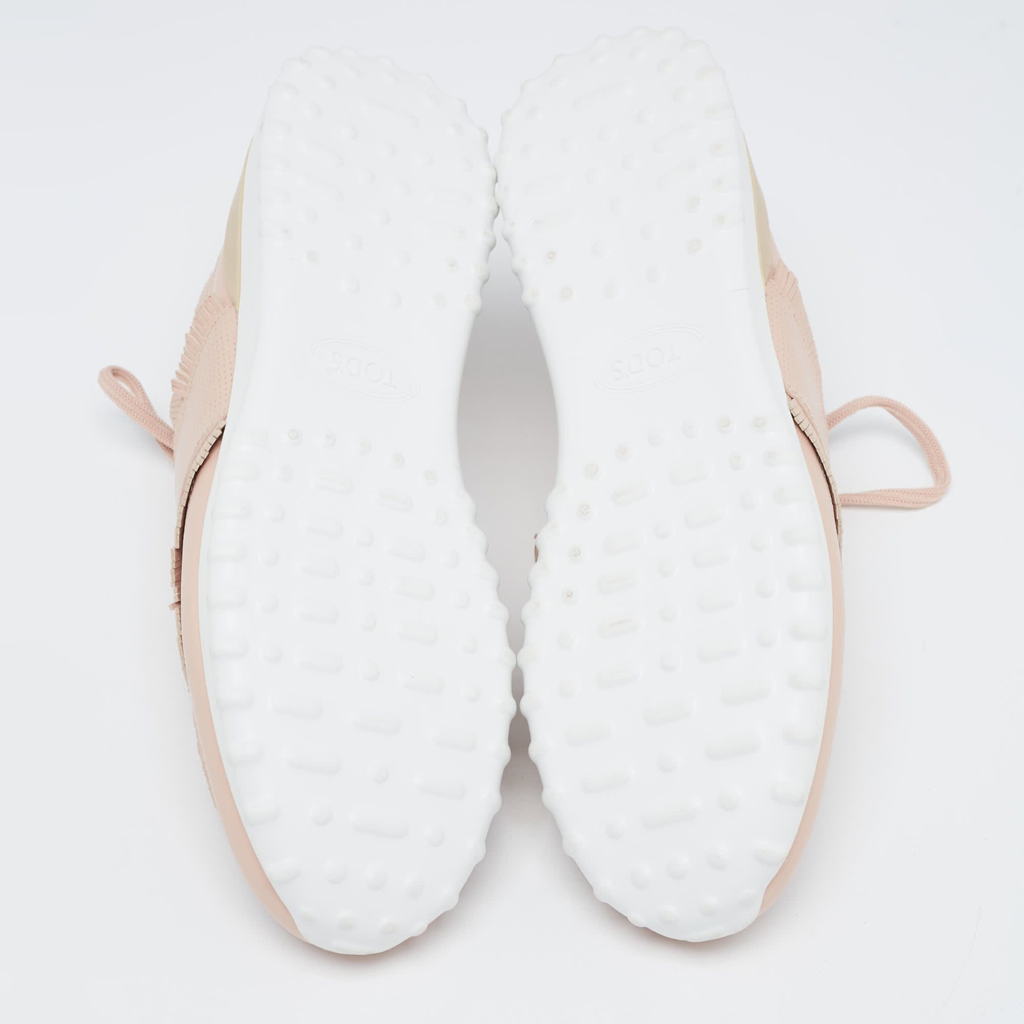 Tod's Pink Perforated Leather Fringed Low Top Sneakers