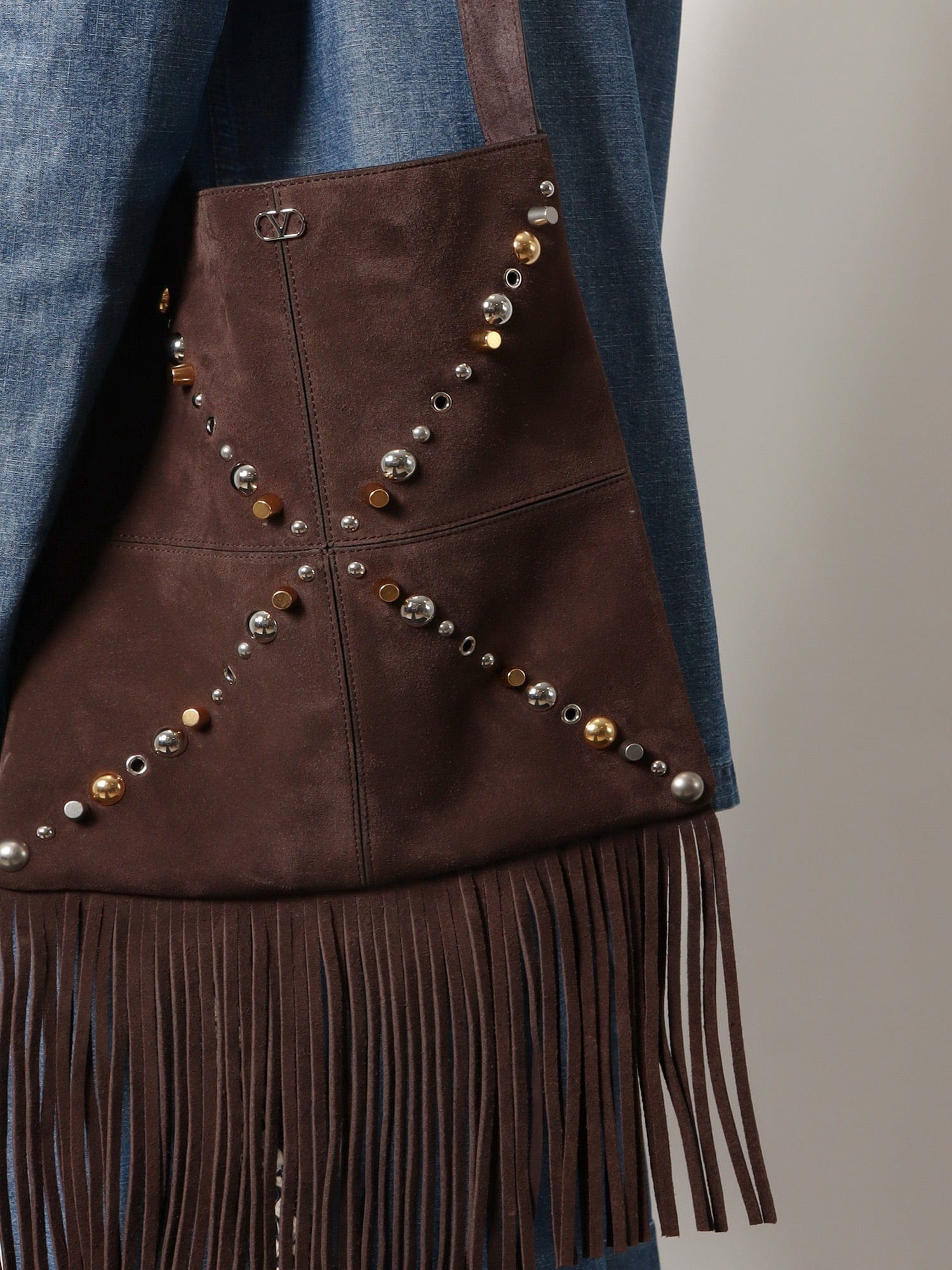 Valentino Garavani Suede shoulder bag with fringes and metal details