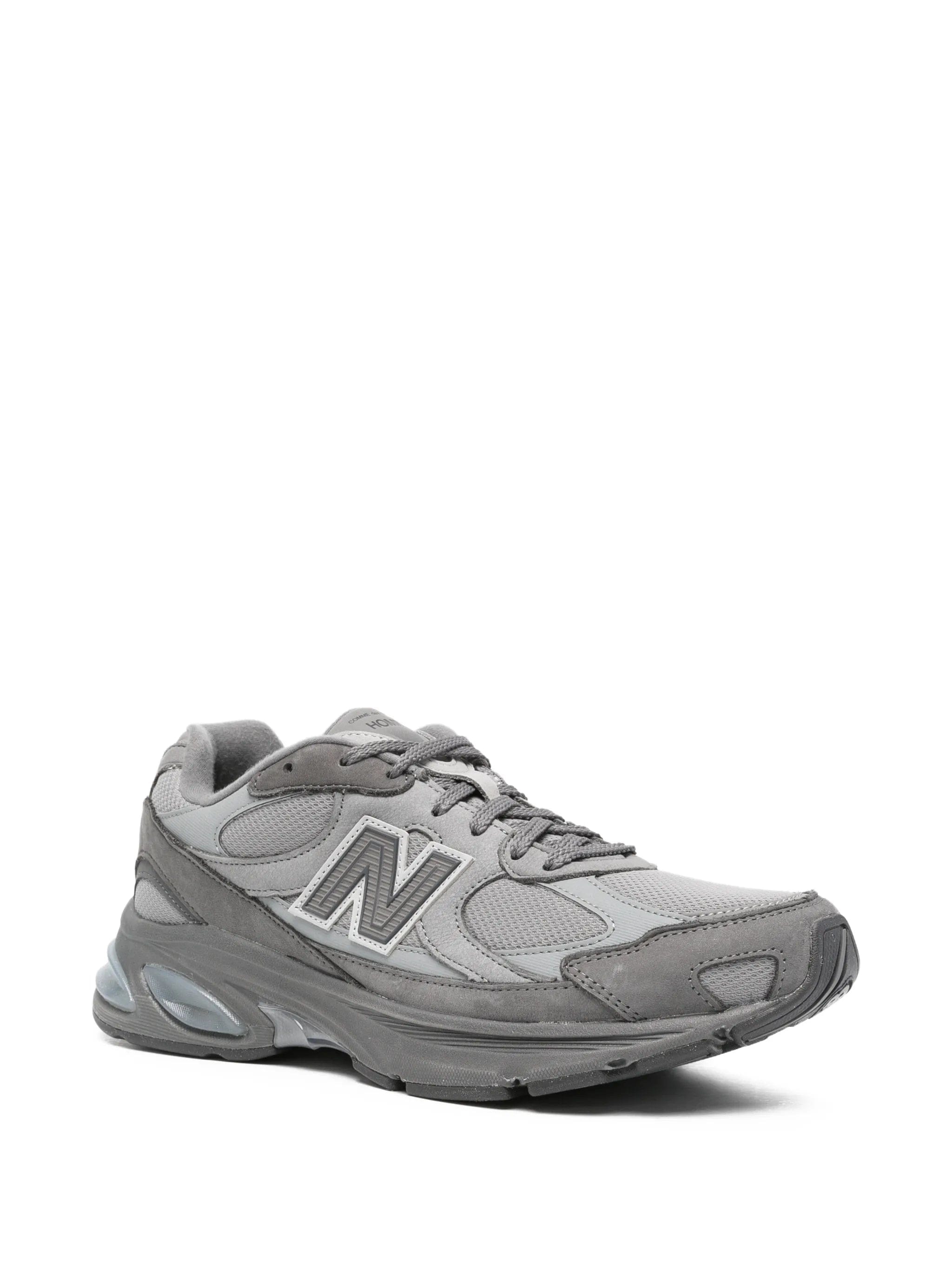 Comme des Garçons Homme x New Balance panelled mesh sneakers