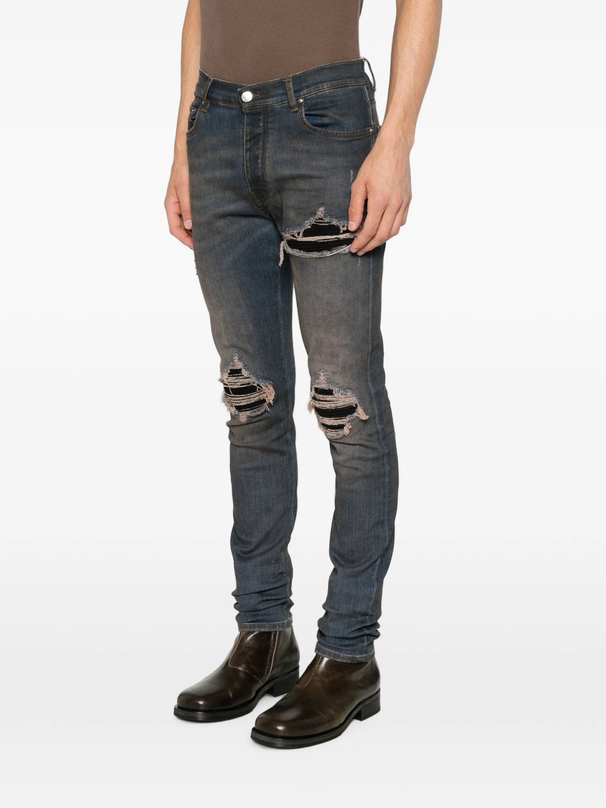 AMIRI Ultrasuede MX1 distressed slim - fit jeans