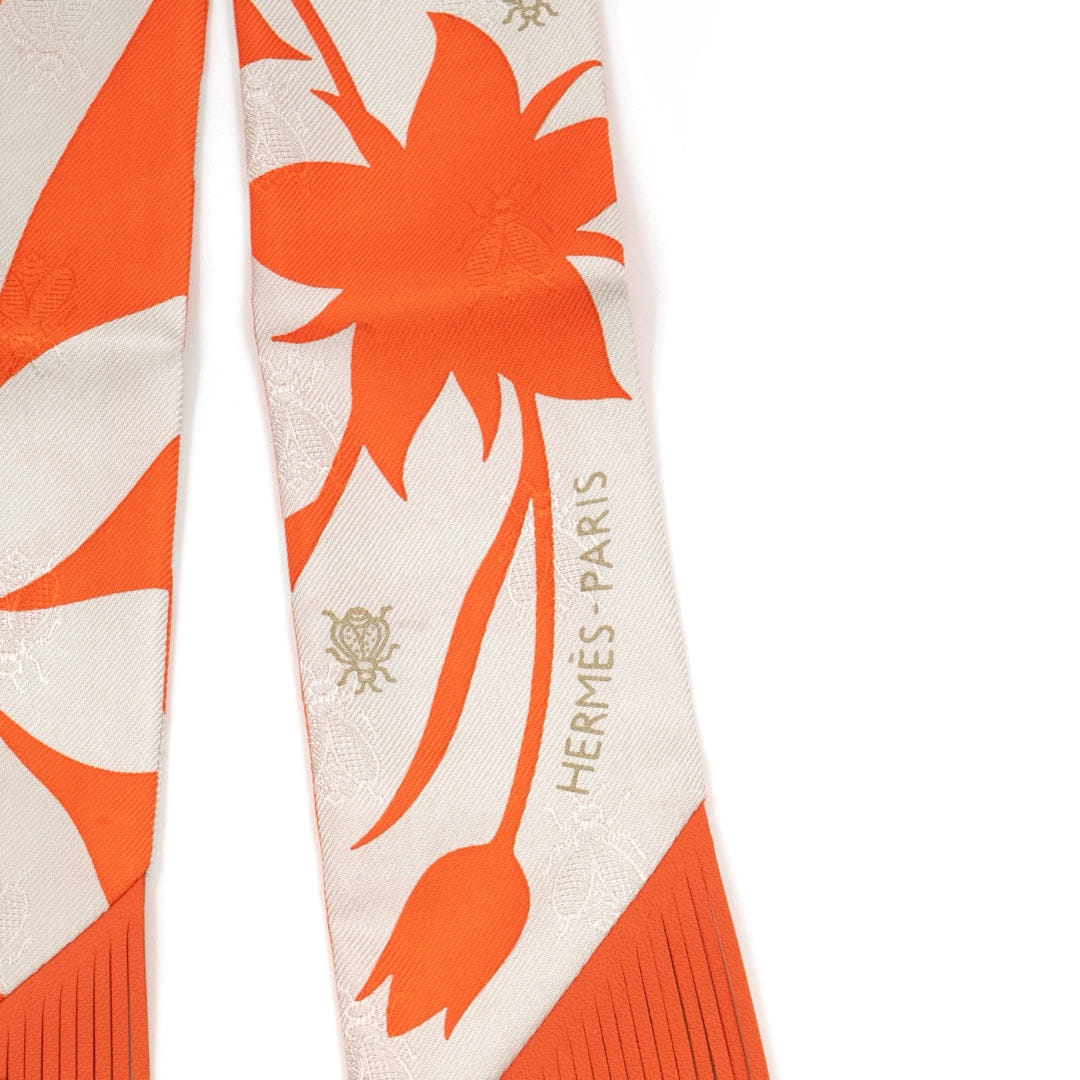 Hermès Bouquet Final Leather Fringe Twilly in Orange Blanc Silk