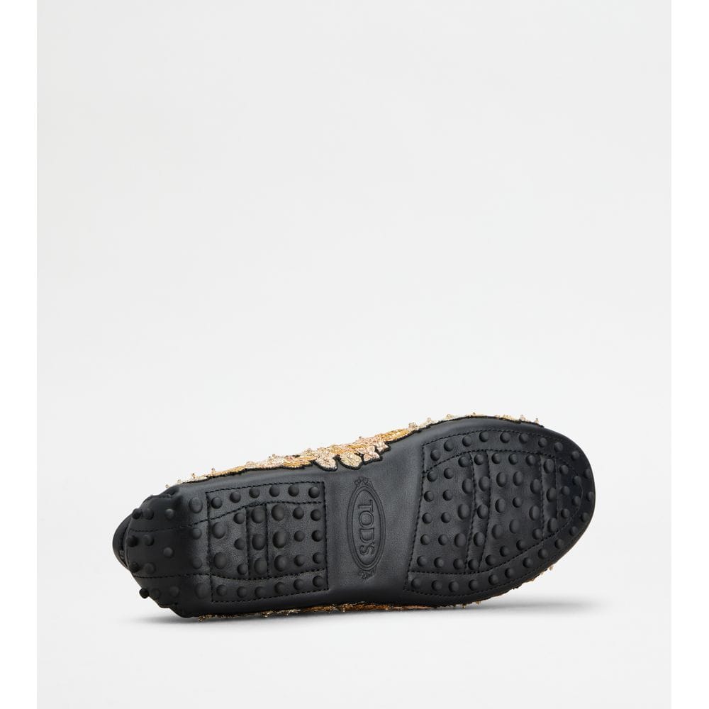 Tod's Tods T Timeless Gommino Driving Shoes In Leather Black Gold Womens