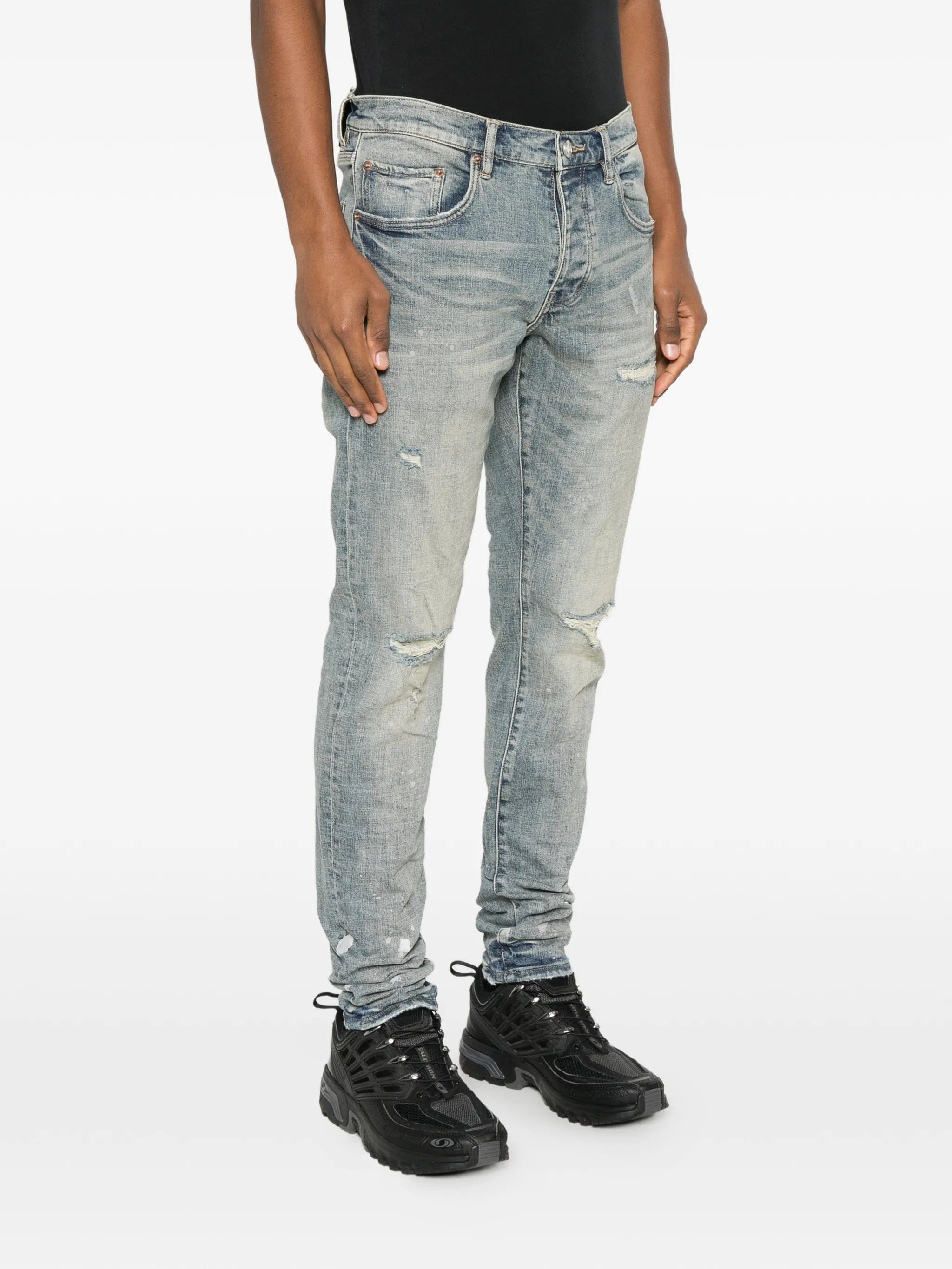 Purple Brand slashed paint jeans
