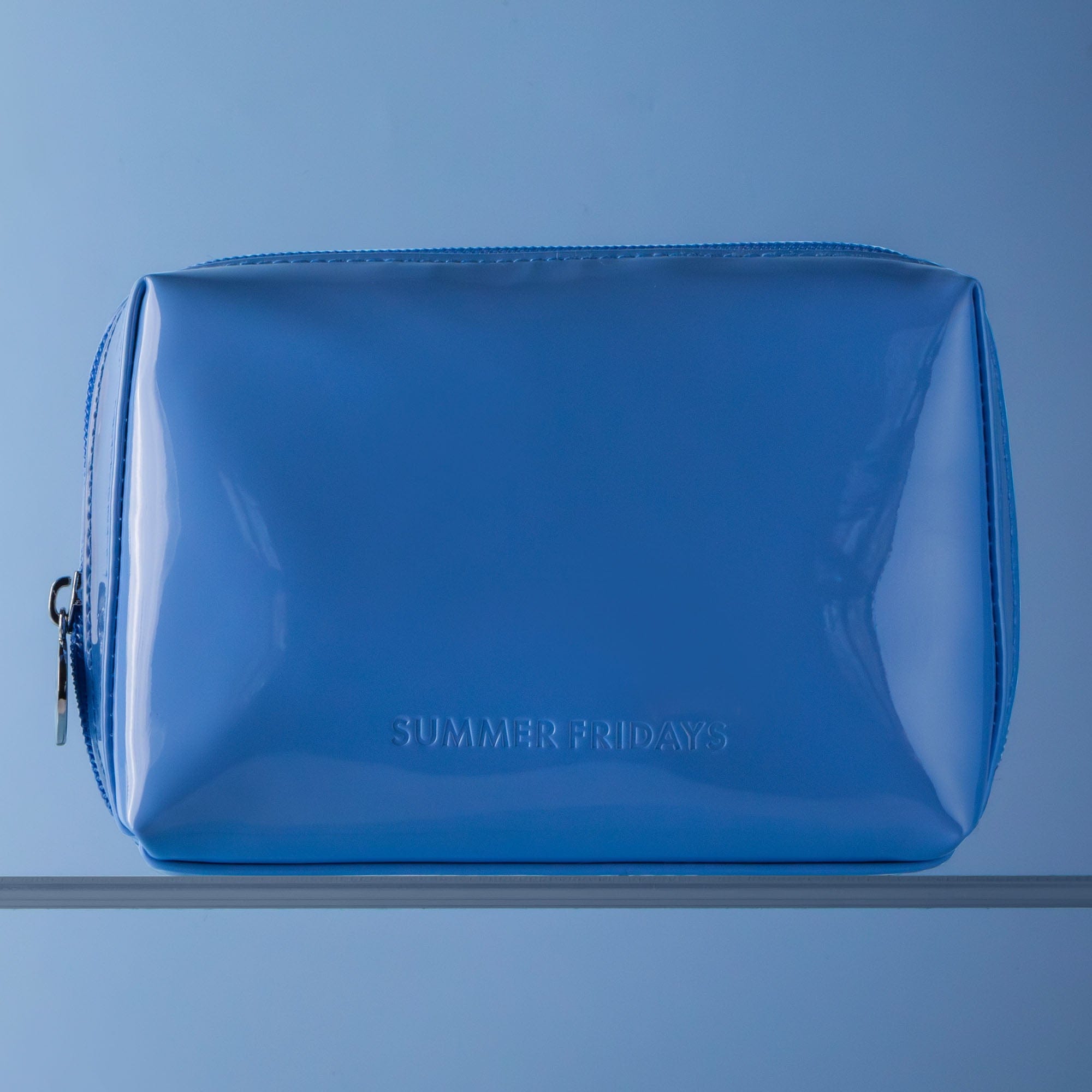 Blue Glossy Pouch in Jet Lag Blue