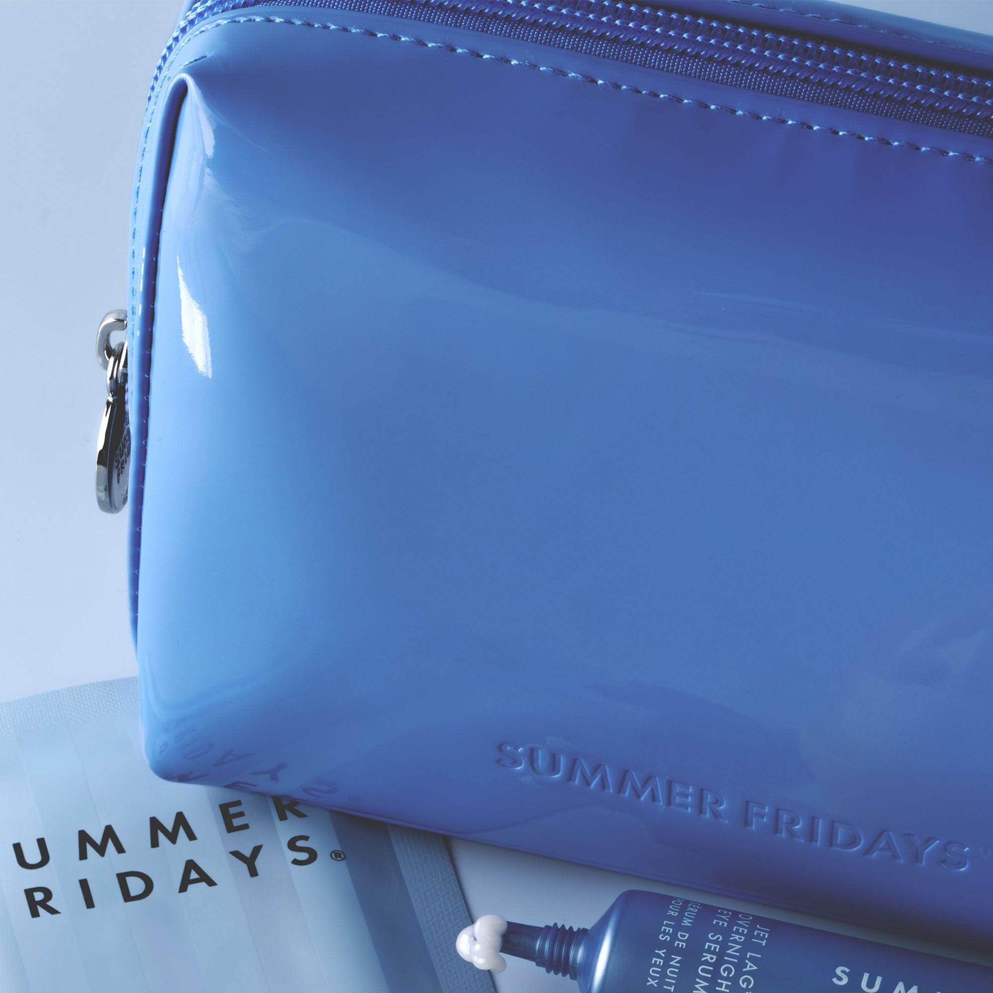 Blue Glossy Pouch in Jet Lag Blue