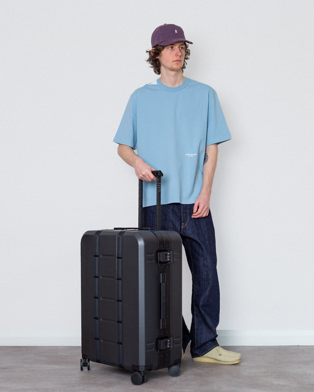 D_b_ Ramverk Pro Check - in Luggage - Black Out