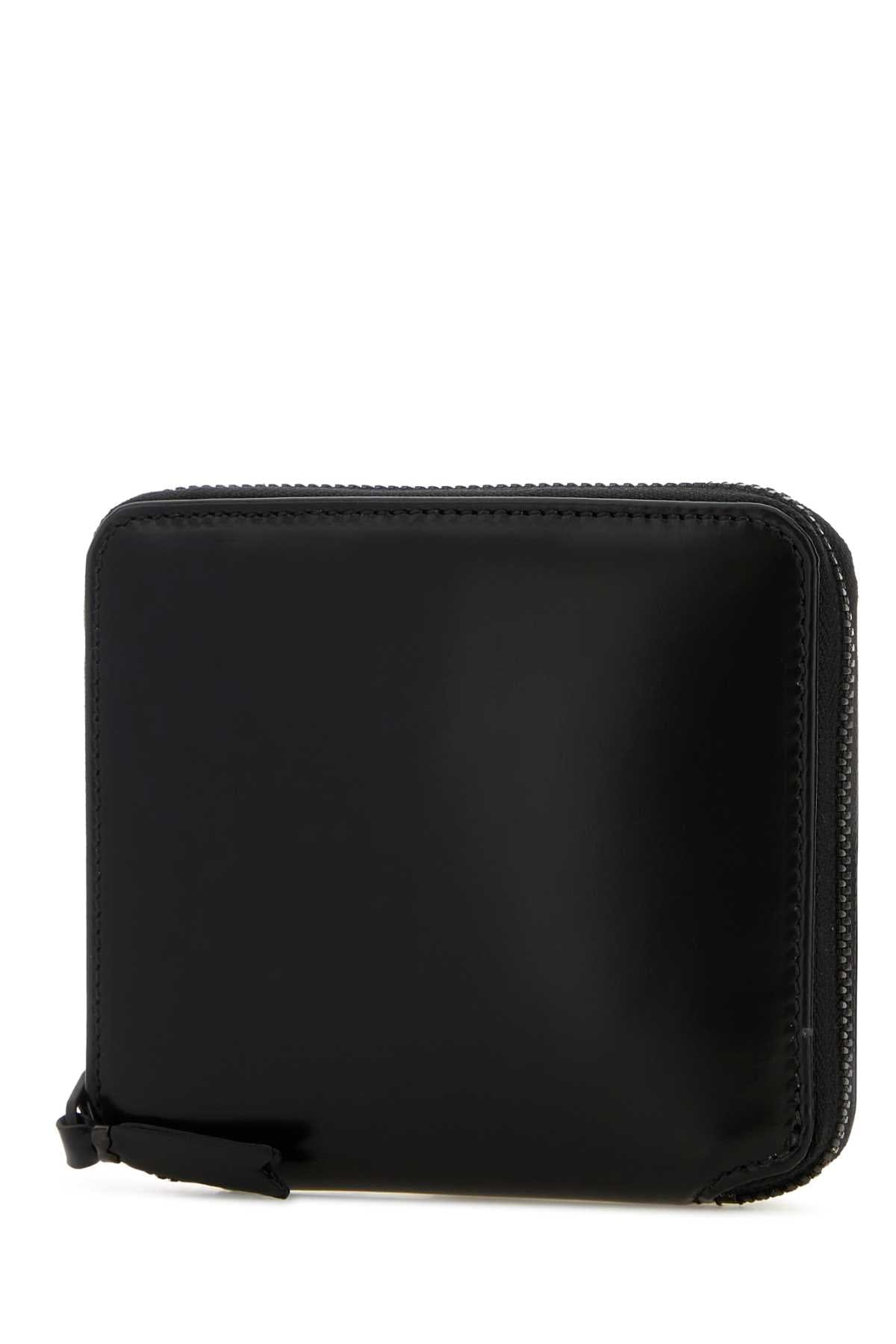 Comme des Garçons Wallets