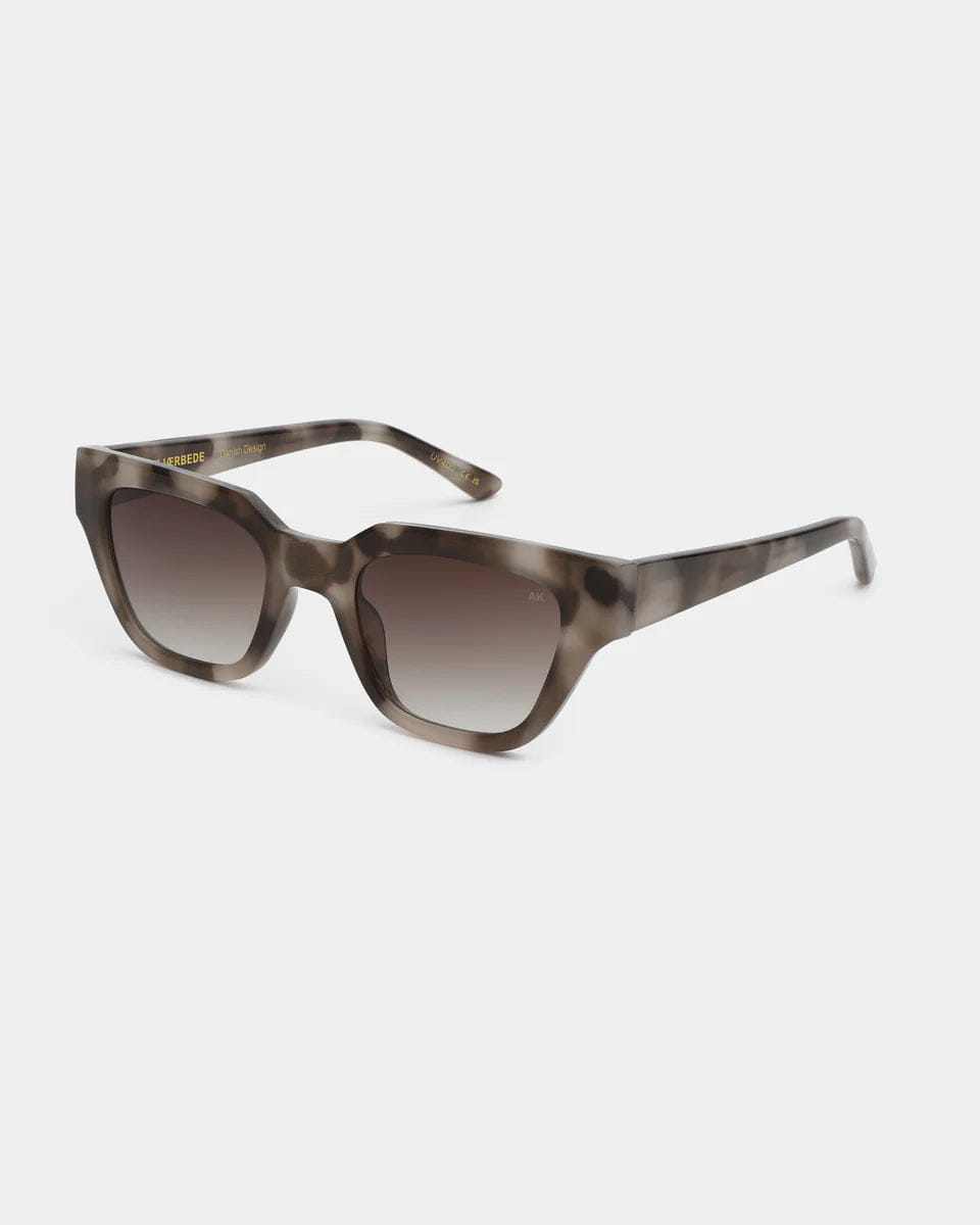 A. Kjaerbede Kaws Sunglasses - Cookie Dough