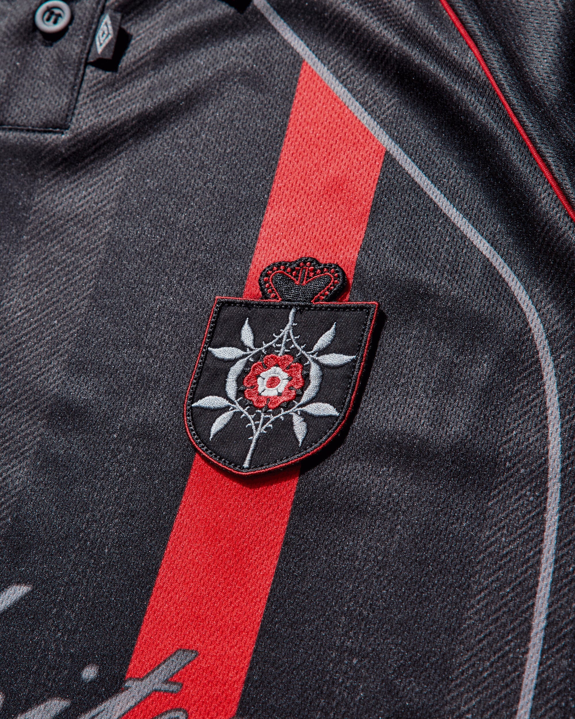 Umbro Men's 01 03 Polo Black / Red