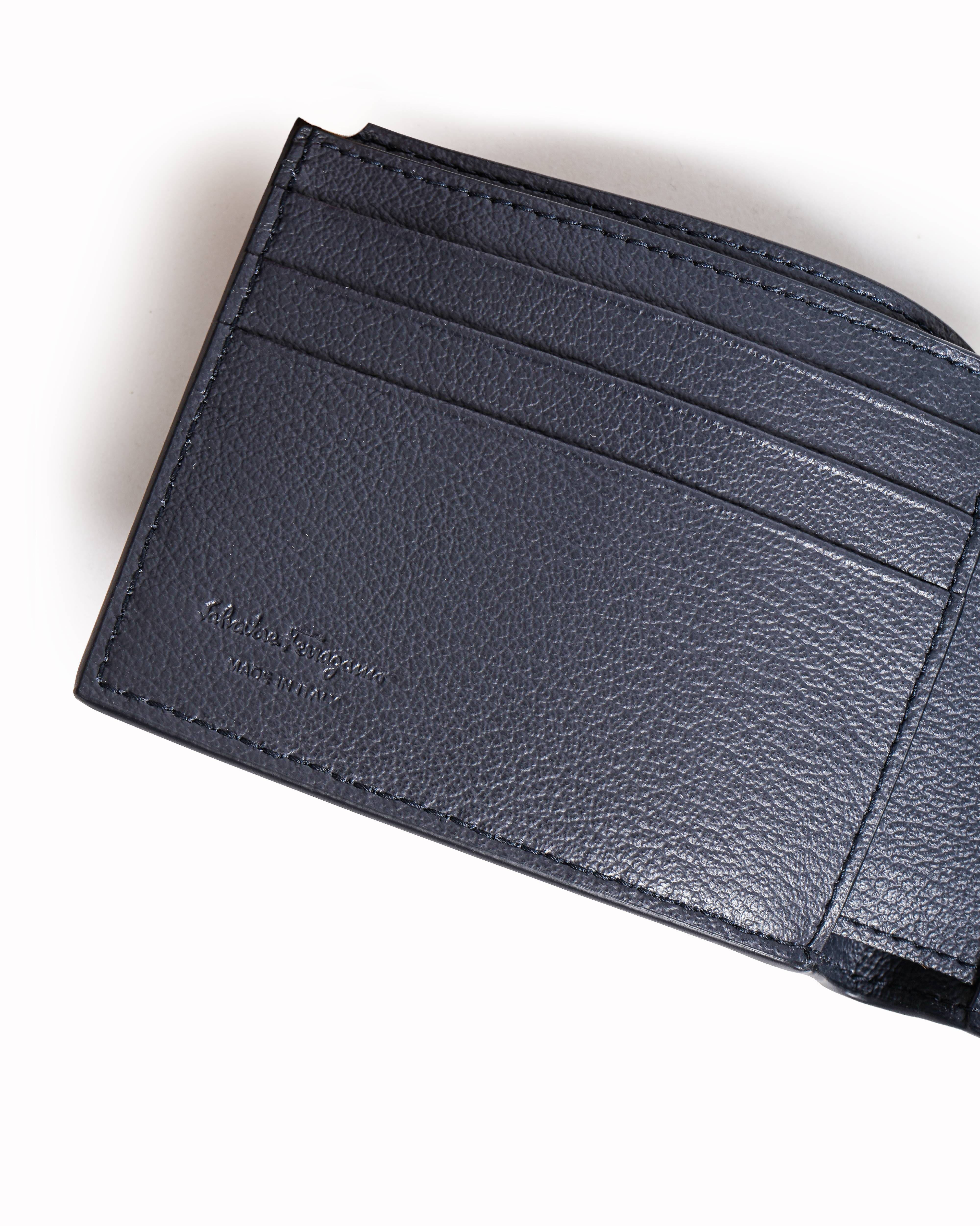 Salvatore Ferragamo Ferragamo Gancini Embossed Leather Bi - Fold Wallet