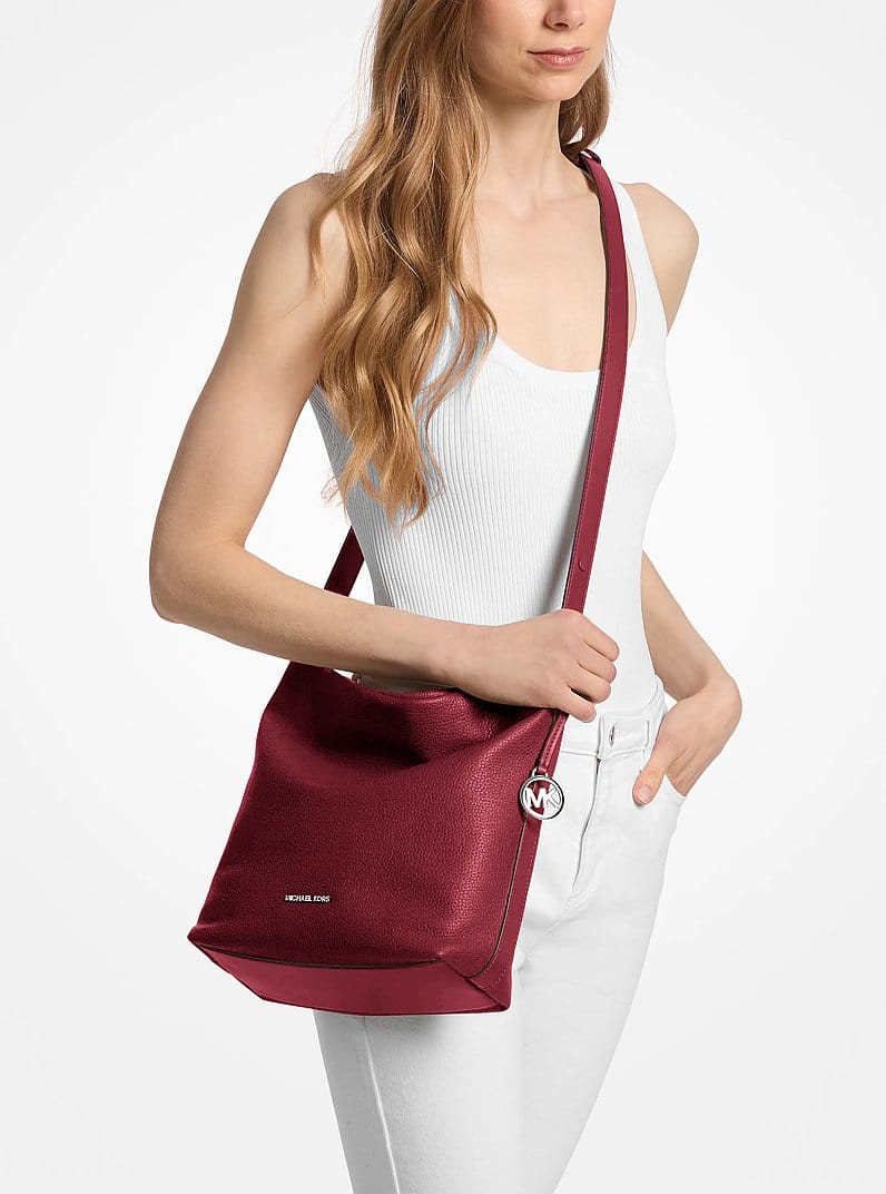 Roey Medium Pebbled Leather Bucket Messenger Bag