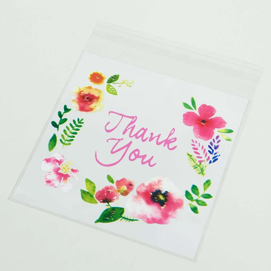 WHITE* 100 Pack White Clear Cookie Candy Bags, Decorative Self Seal Goodie Bags with Thank You Floral Accents for Wedding Party Favors