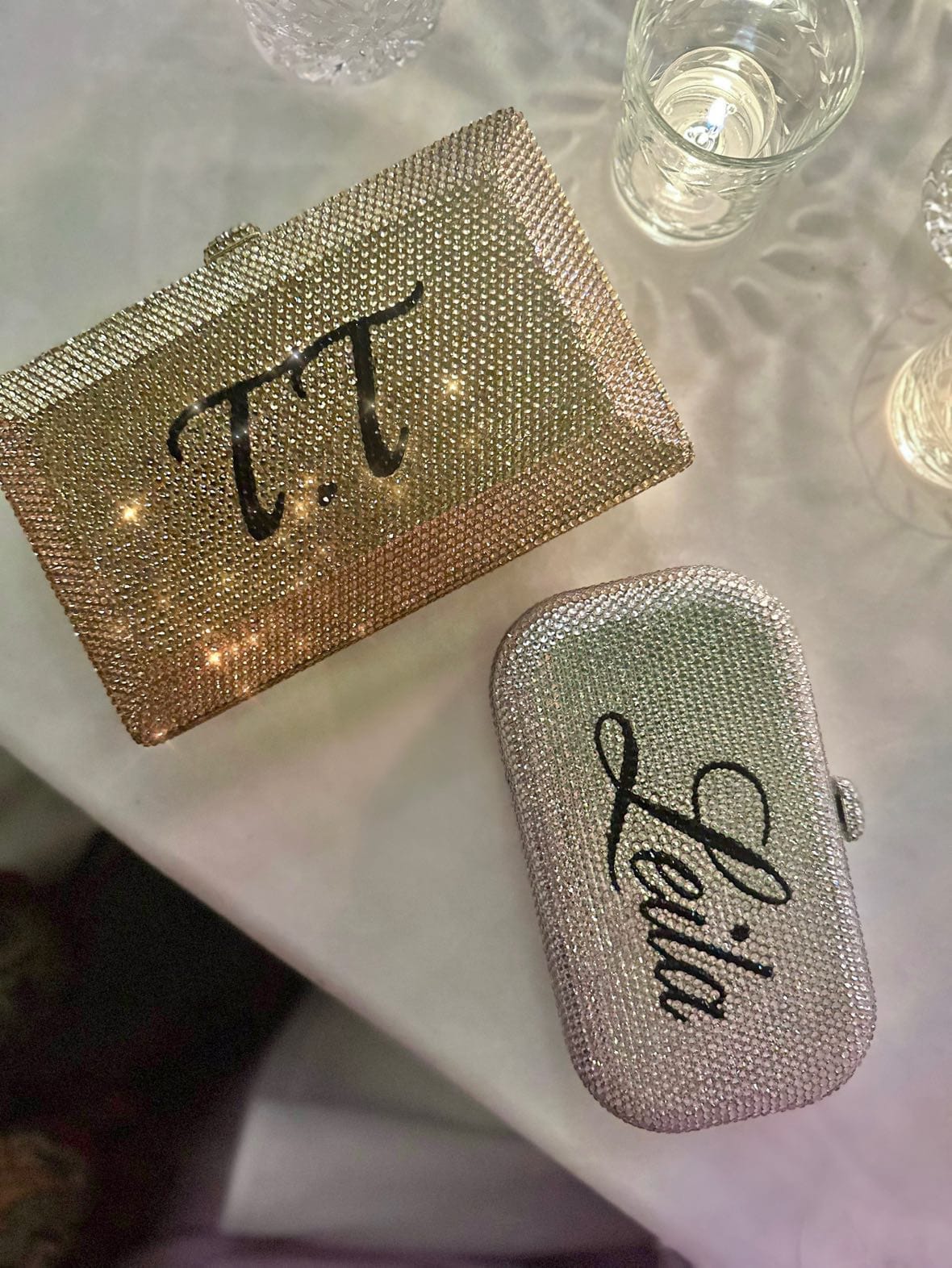 Ruya Customisable RÜYA Small Curve bag with a silver crystal finish and black personalised lettering. AKC0736