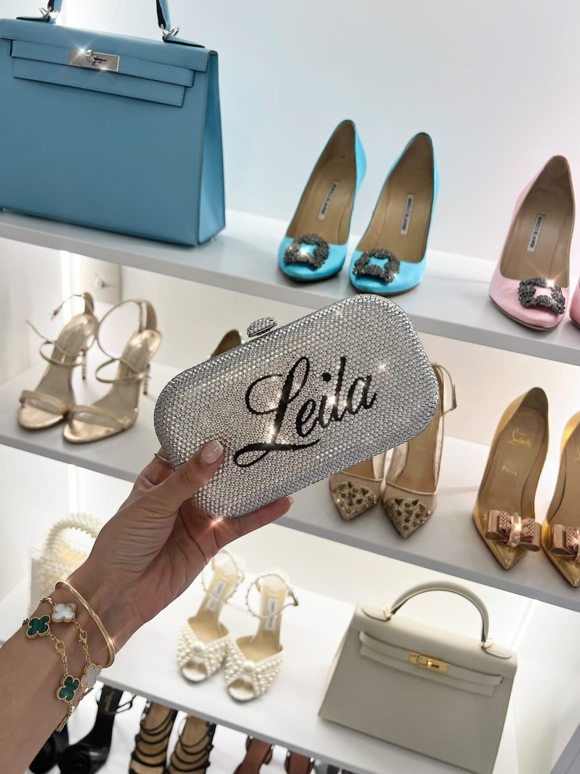 Ruya Customisable RÜYA Small Curve bag with a silver crystal finish and black personalised lettering. AKC0736