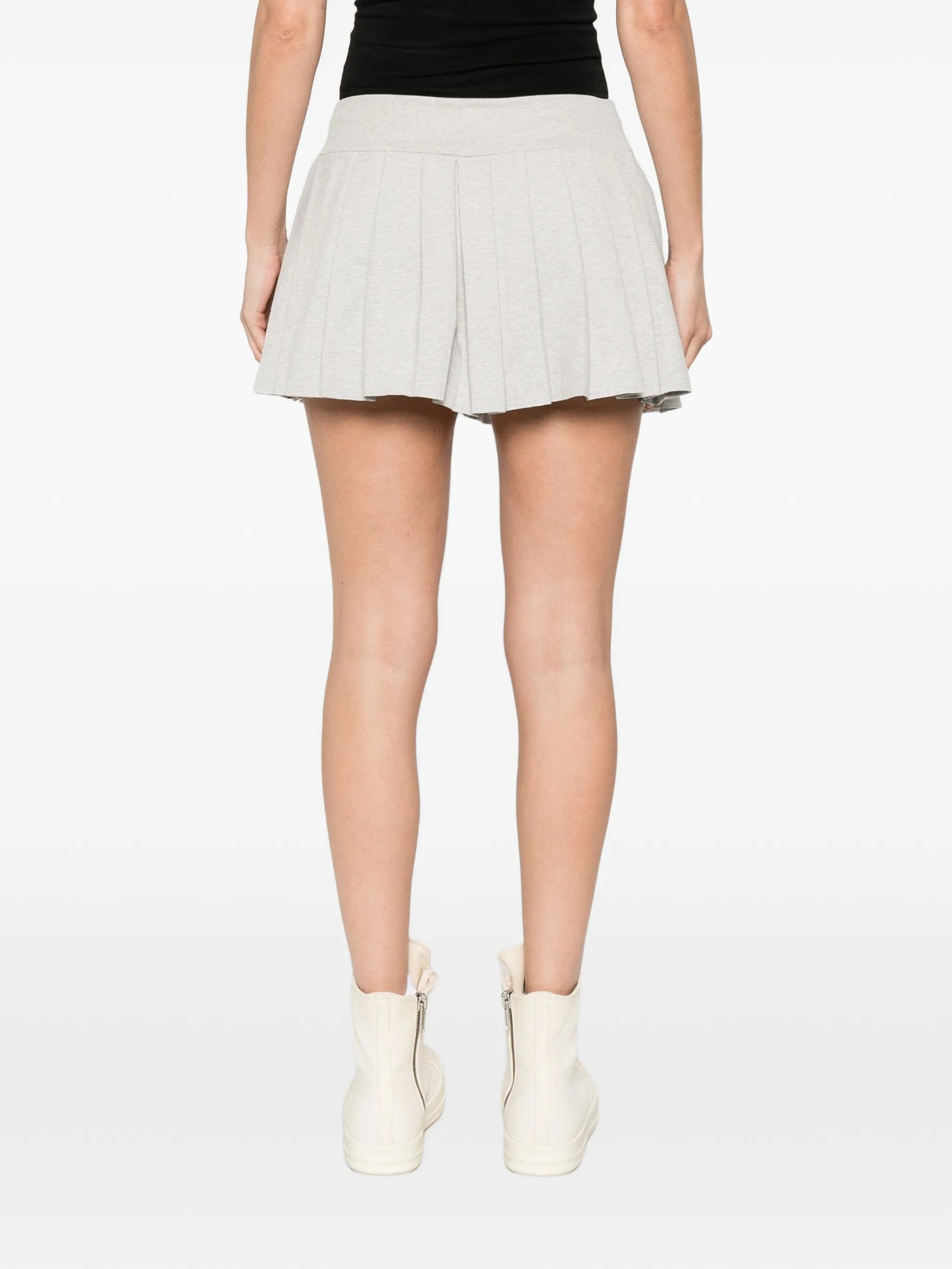 Norma Kamali pleated pickleball mini skirt