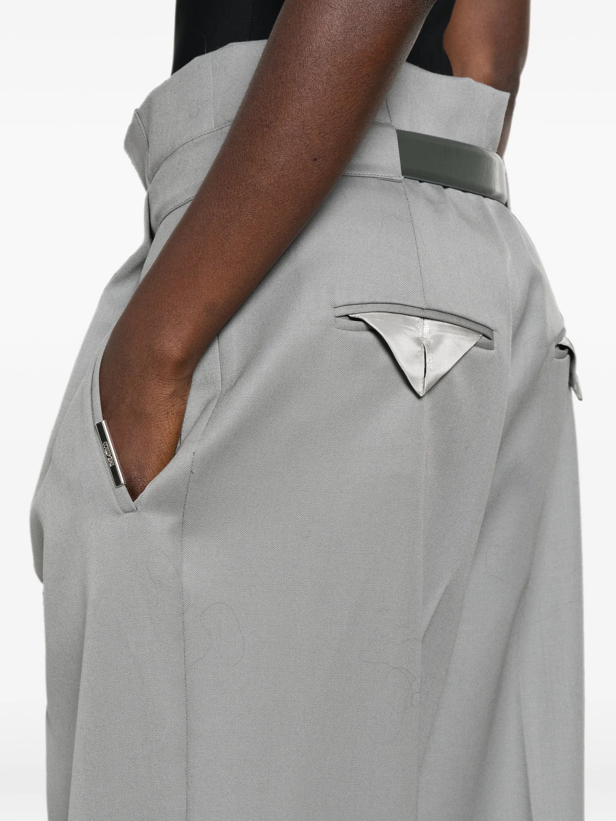 The Attico pleated belted trousers