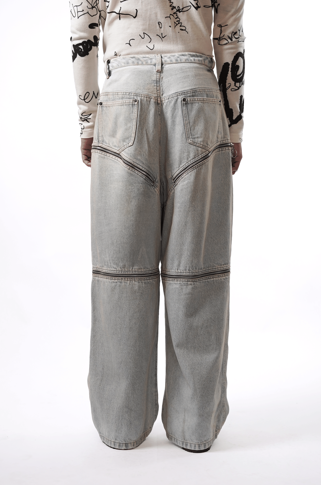 High - waisted zippered trousers with multi - zipper detailing (Indigo)