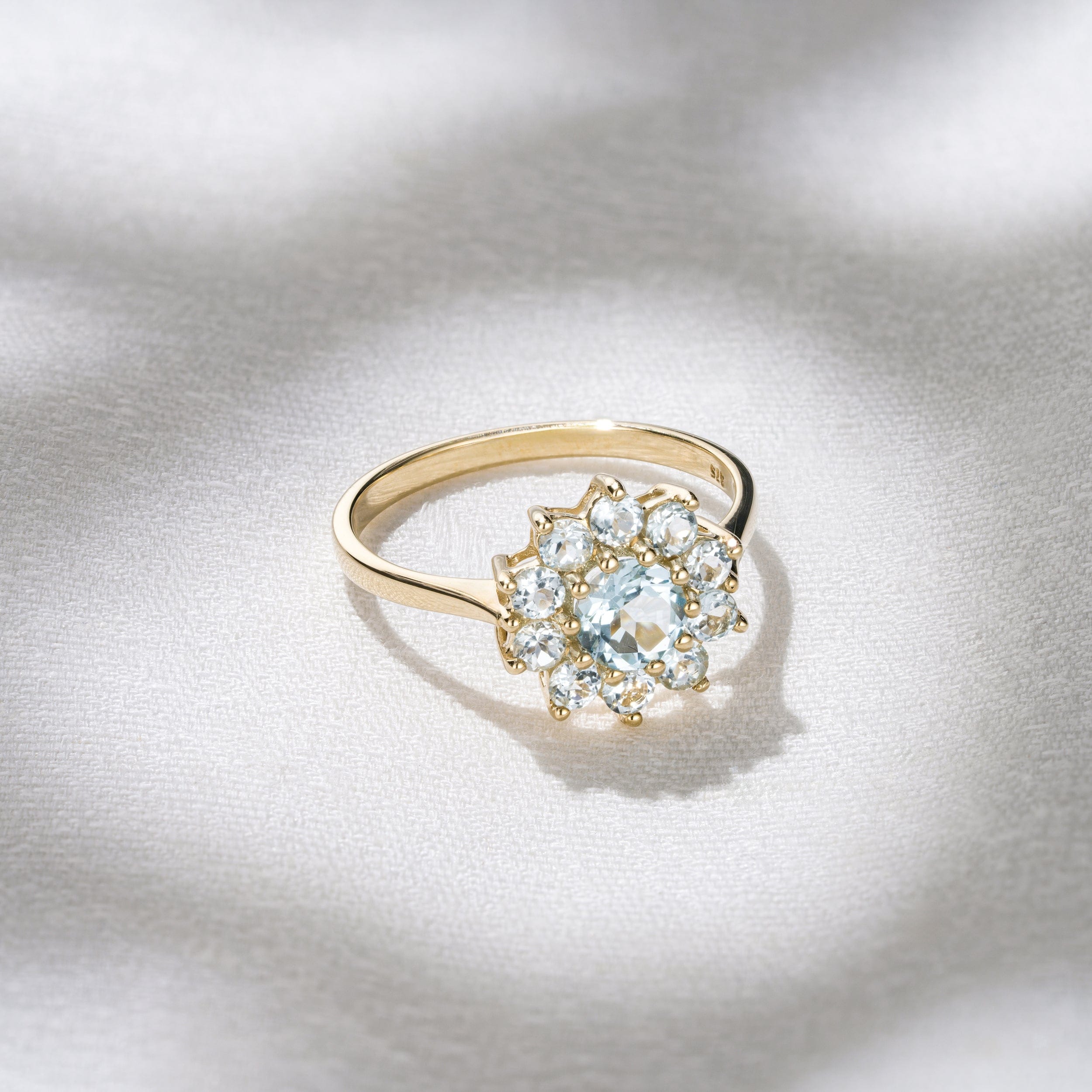 Yellow 1.10ct Blue Topaz Cluster Ring in 9K Yellow Gold