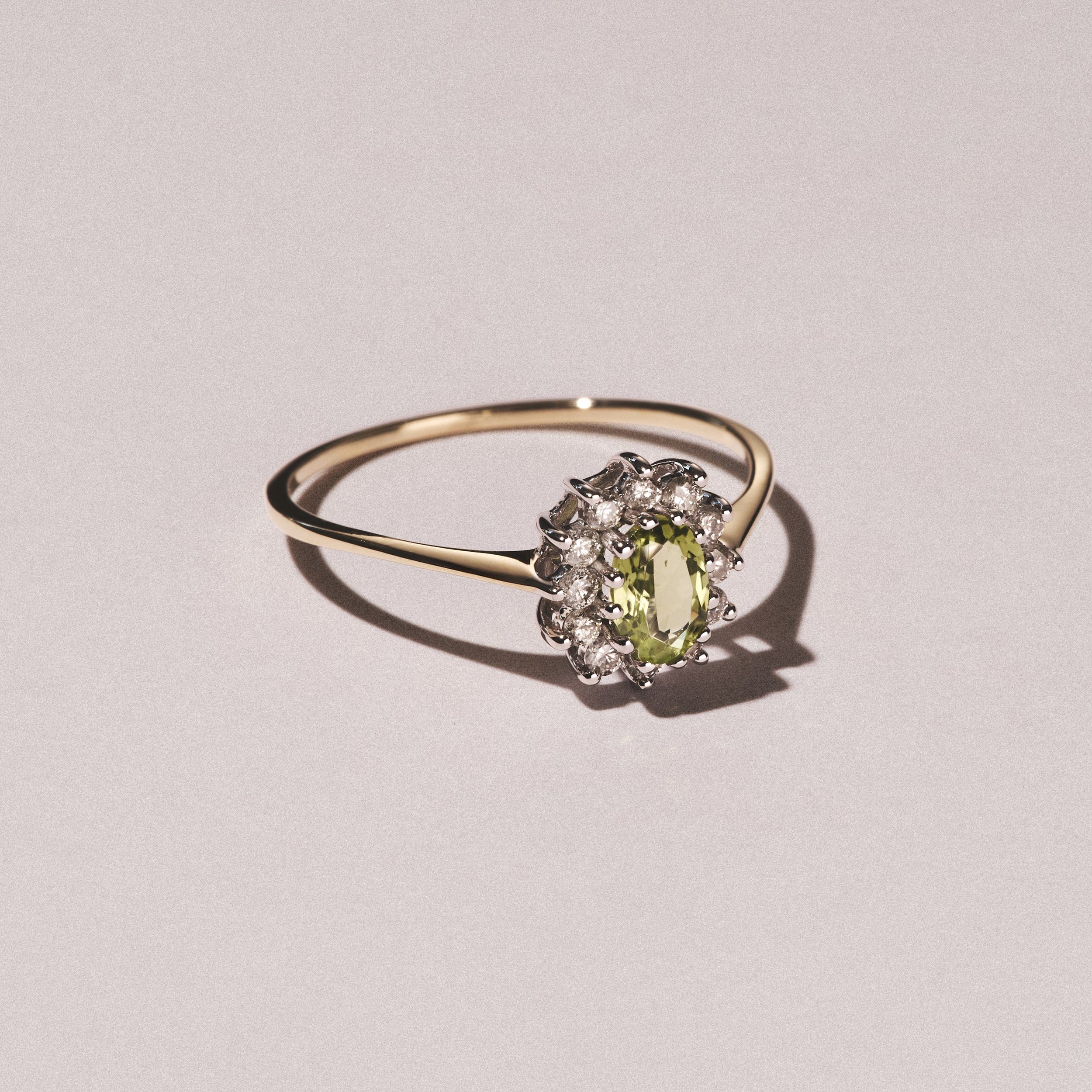 Diamond Peridot 5 x 3 mm And Diamond 9K Yellow Gold Ring