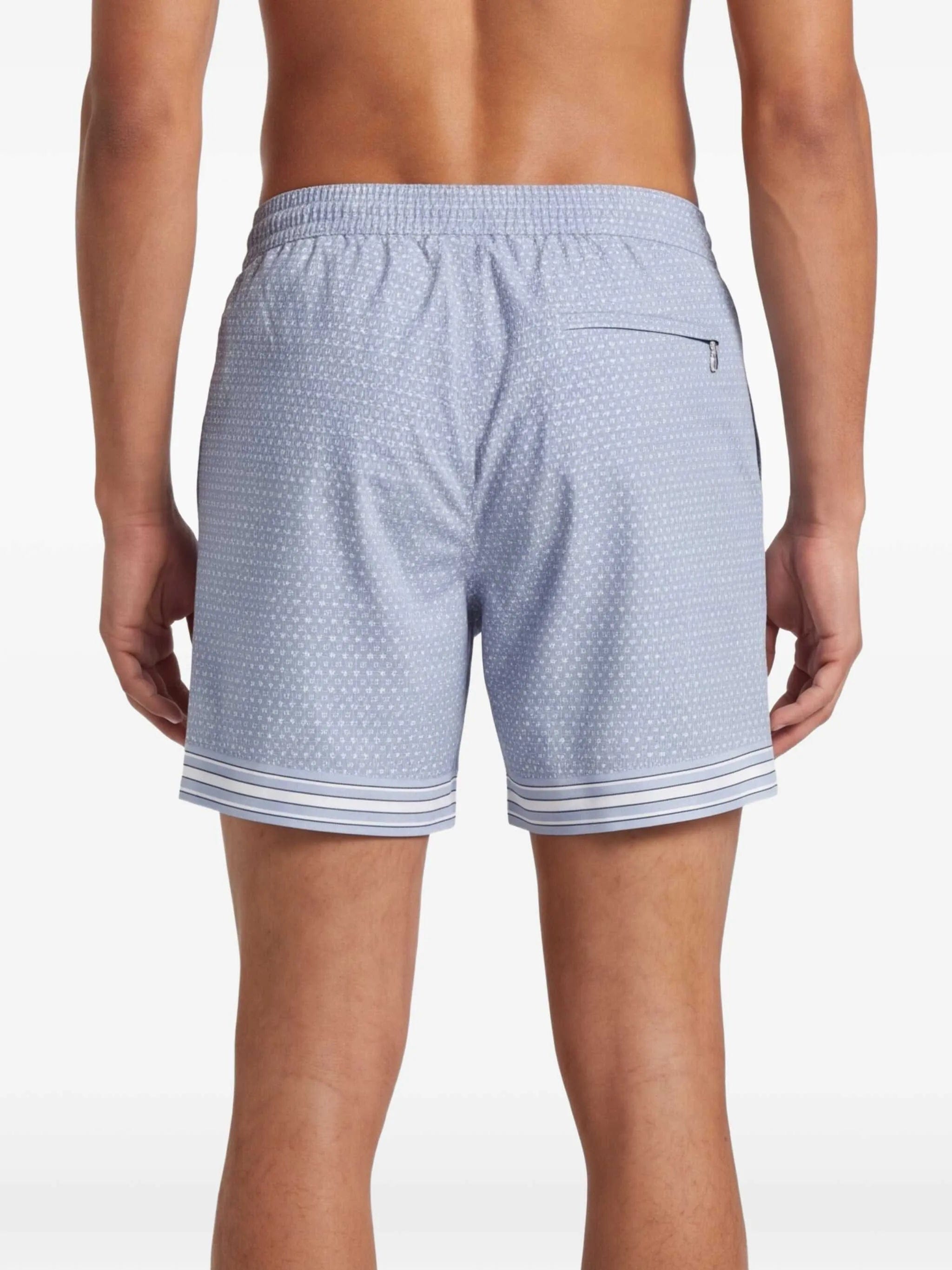 CHÉ Lucena geometric - print swim shorts