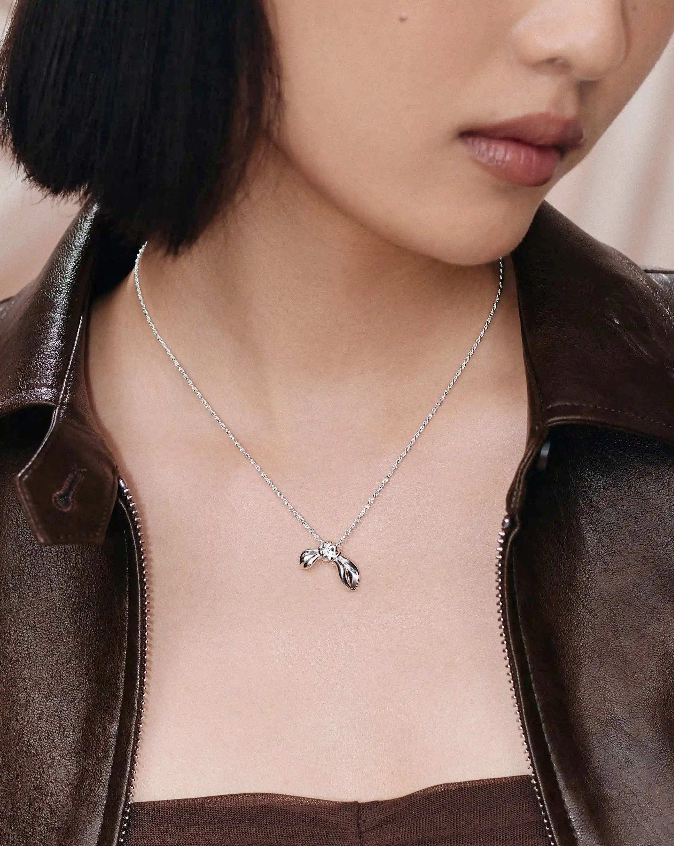Missoma MARKGONG Bow Pendant Necklace | Silver Plated