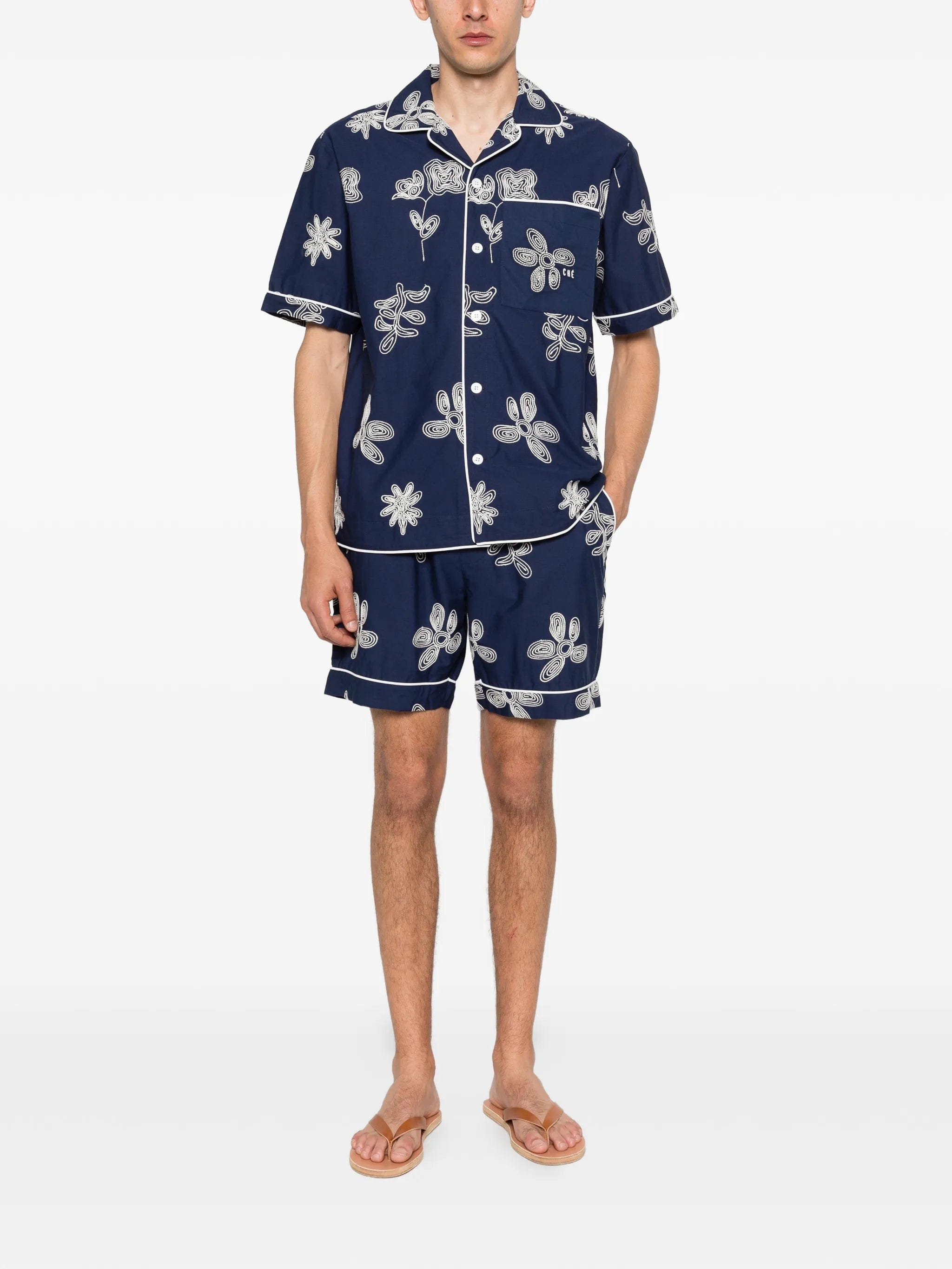 CHÉ Flores shorts