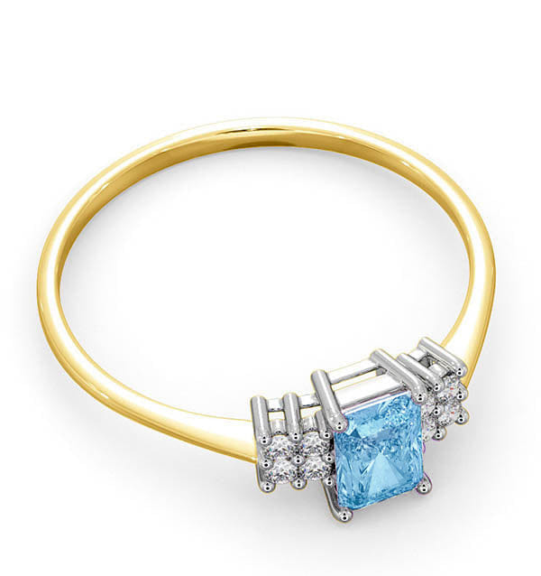 Diamond Blue Topaz 6 x 4 mm And Diamond Ring 9K Yellow Gold