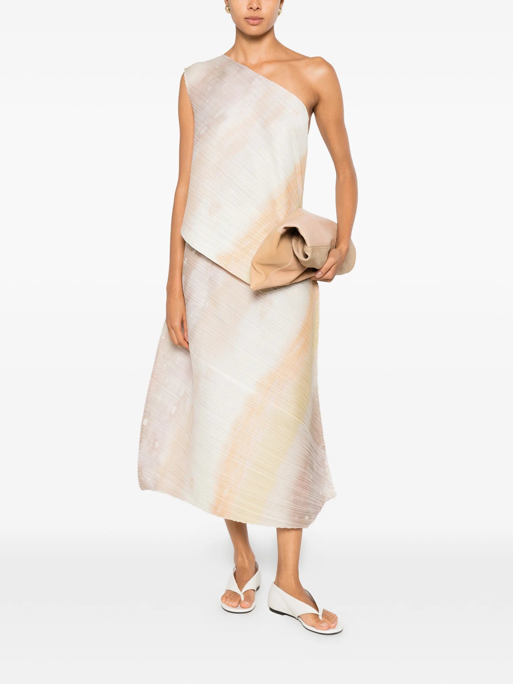 Pleats Please Issey Miyake pleated abstract - print midi skirt